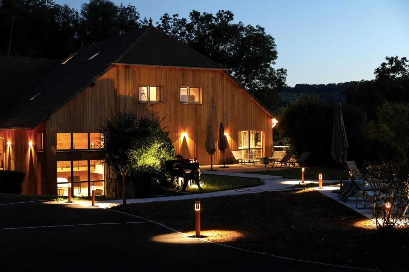 Swimming pool in Maison d'hôtes & SPA La Scierie