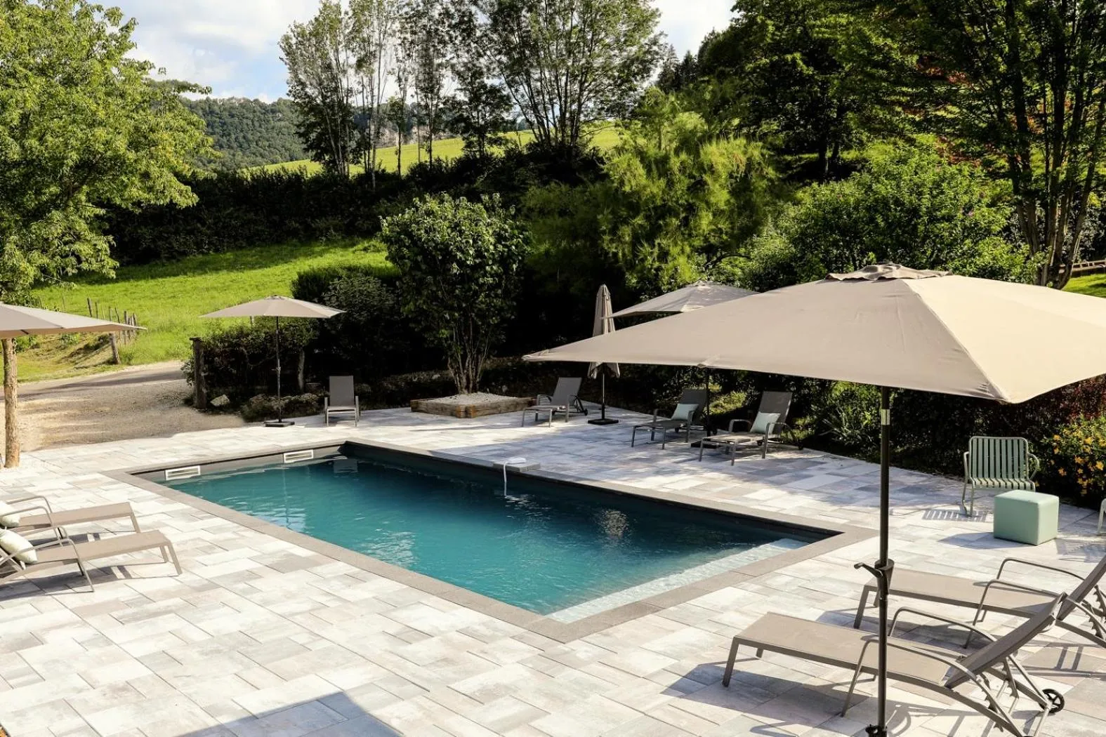 Swimming pool in Maison d'hôtes & SPA La Scierie
