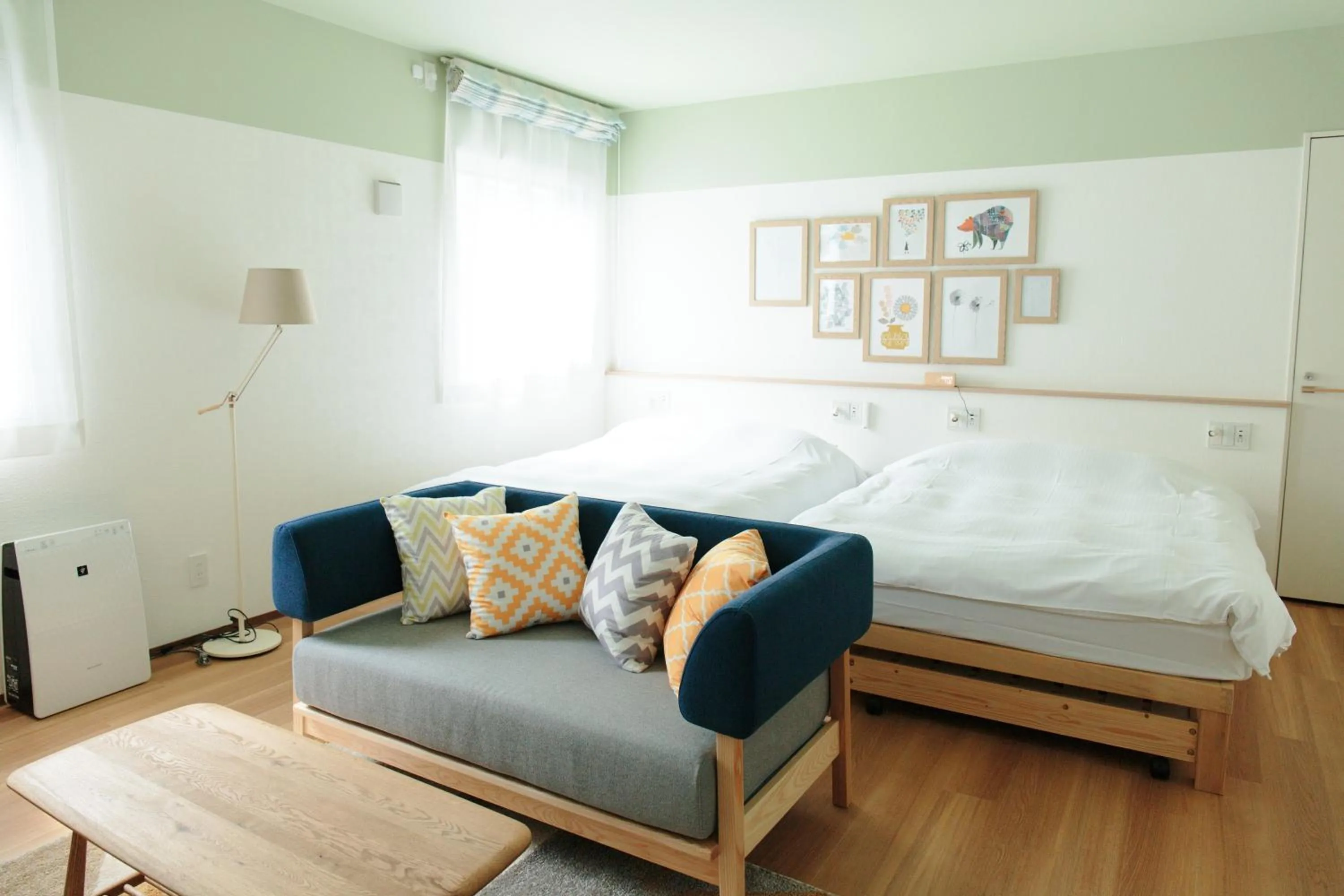 Living room, Bed in Hotel Potmum Sapporo