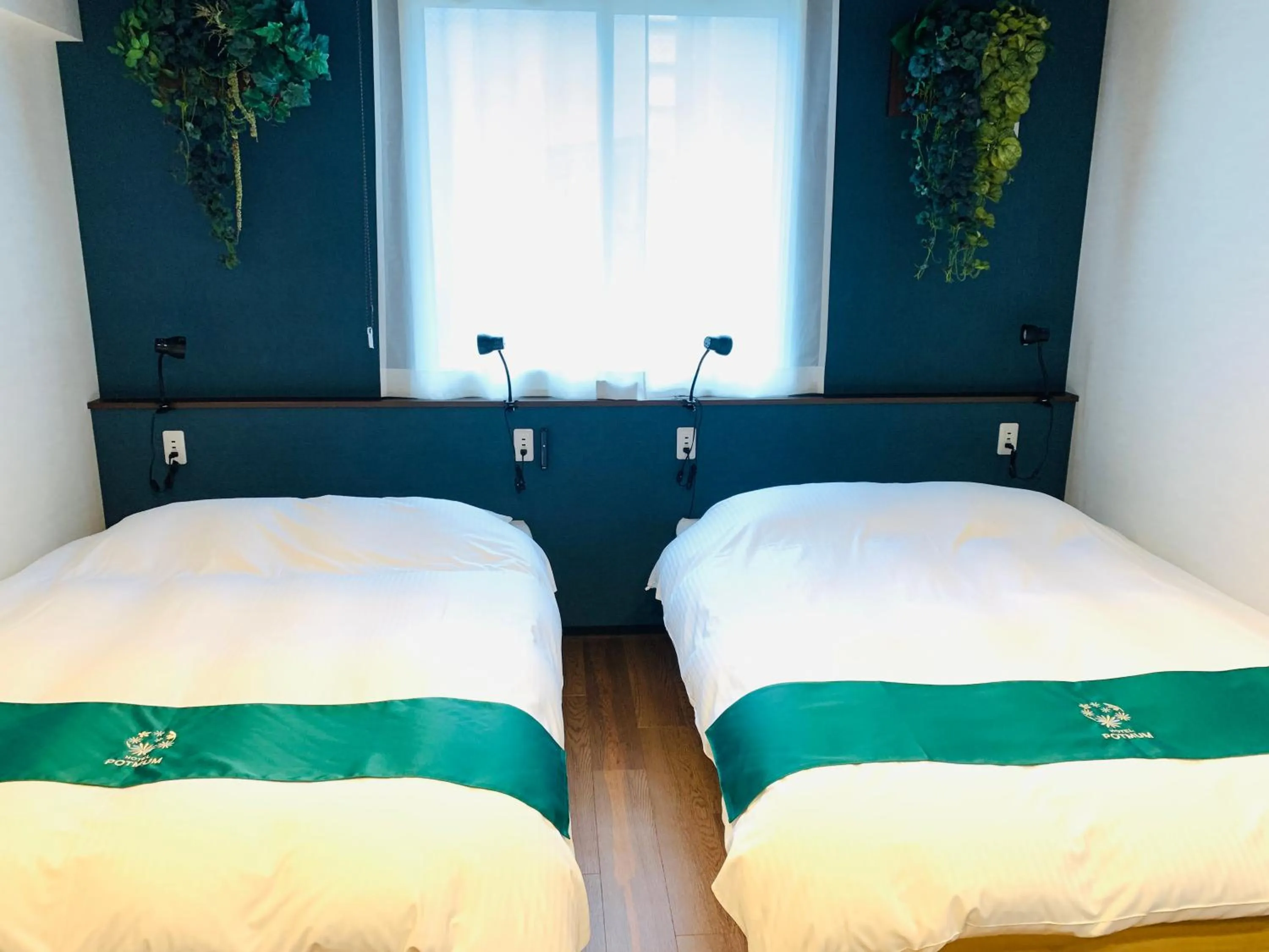 Bed in Hotel Potmum Sapporo