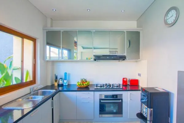 Kitchen or kitchenette in Sun Shoot Villas Seminyak