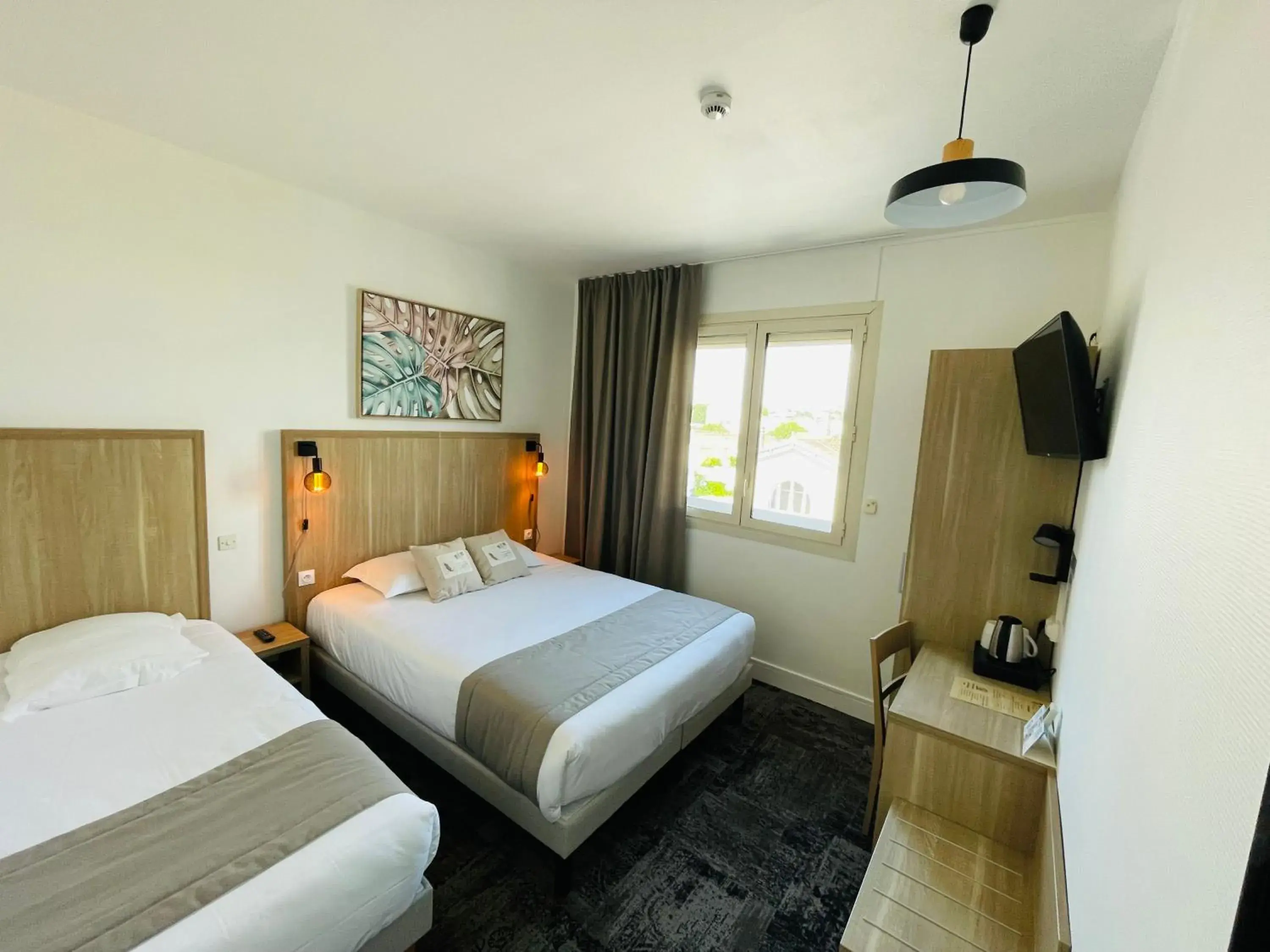 Bed in Logis Le Passiflore Cognac Bed in Logis Le Passiflore Cognac