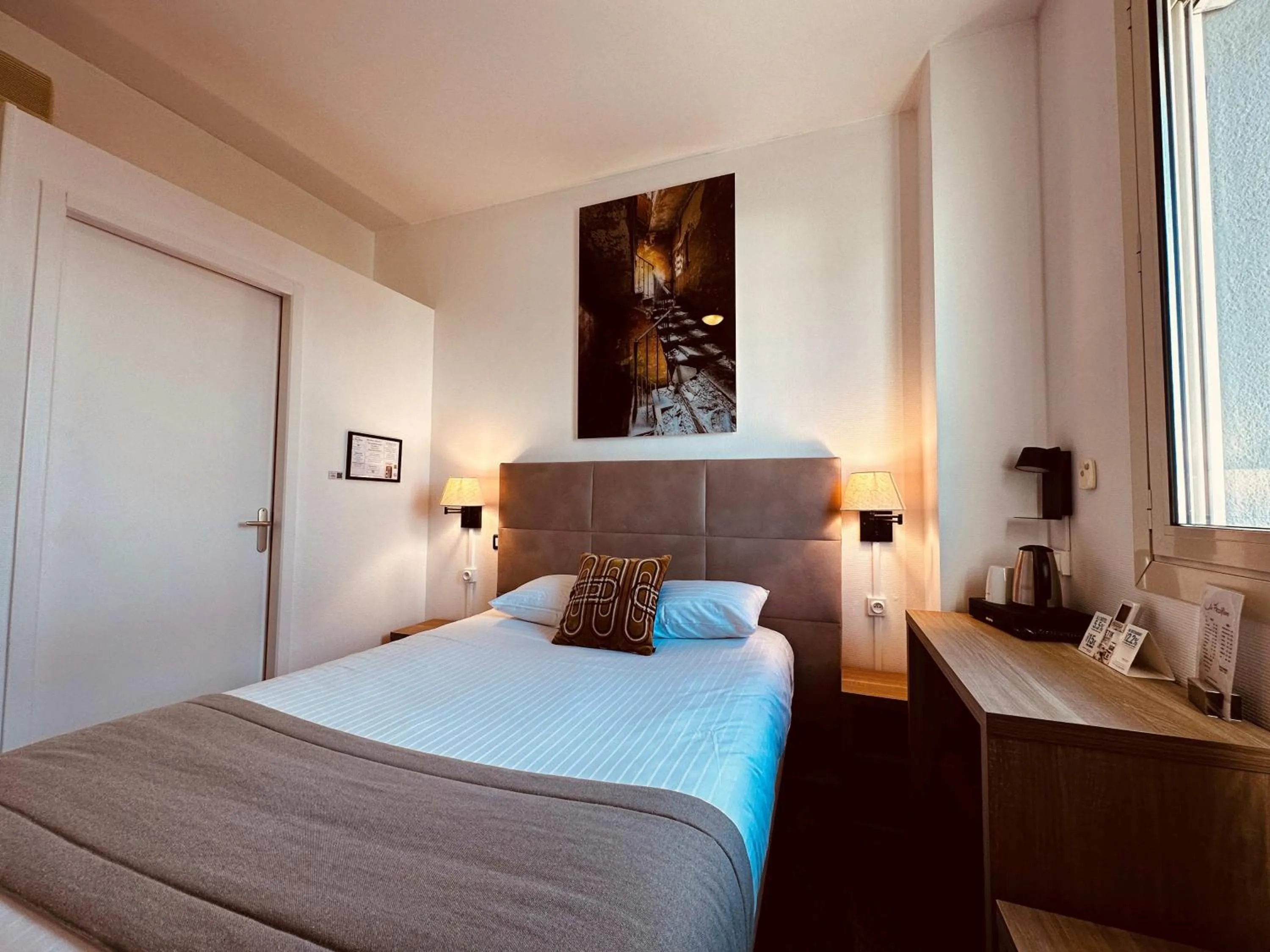 Decorative detail, Bed in Logis Le Passiflore Cognac