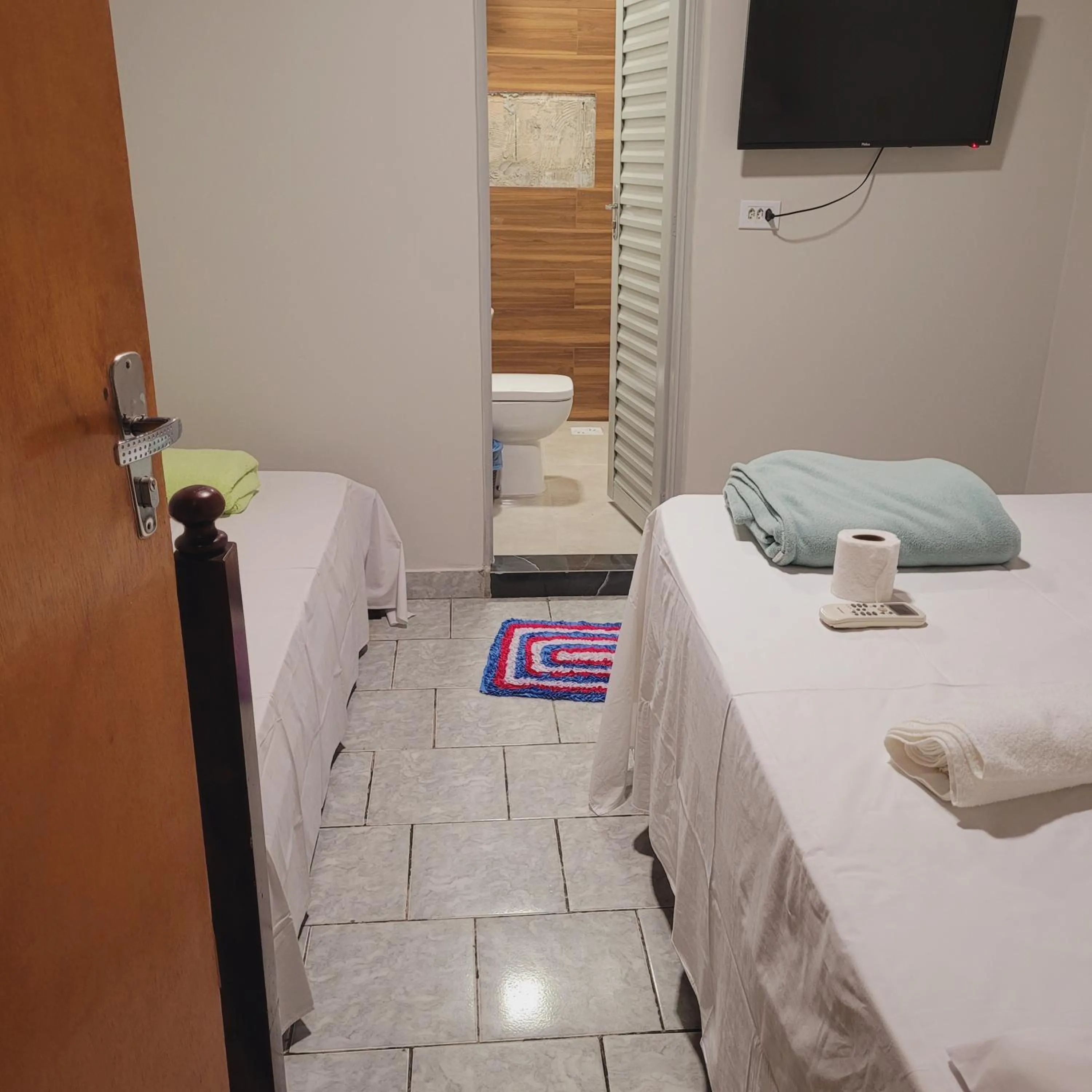 Toilet, Bed in Hilton Hotel