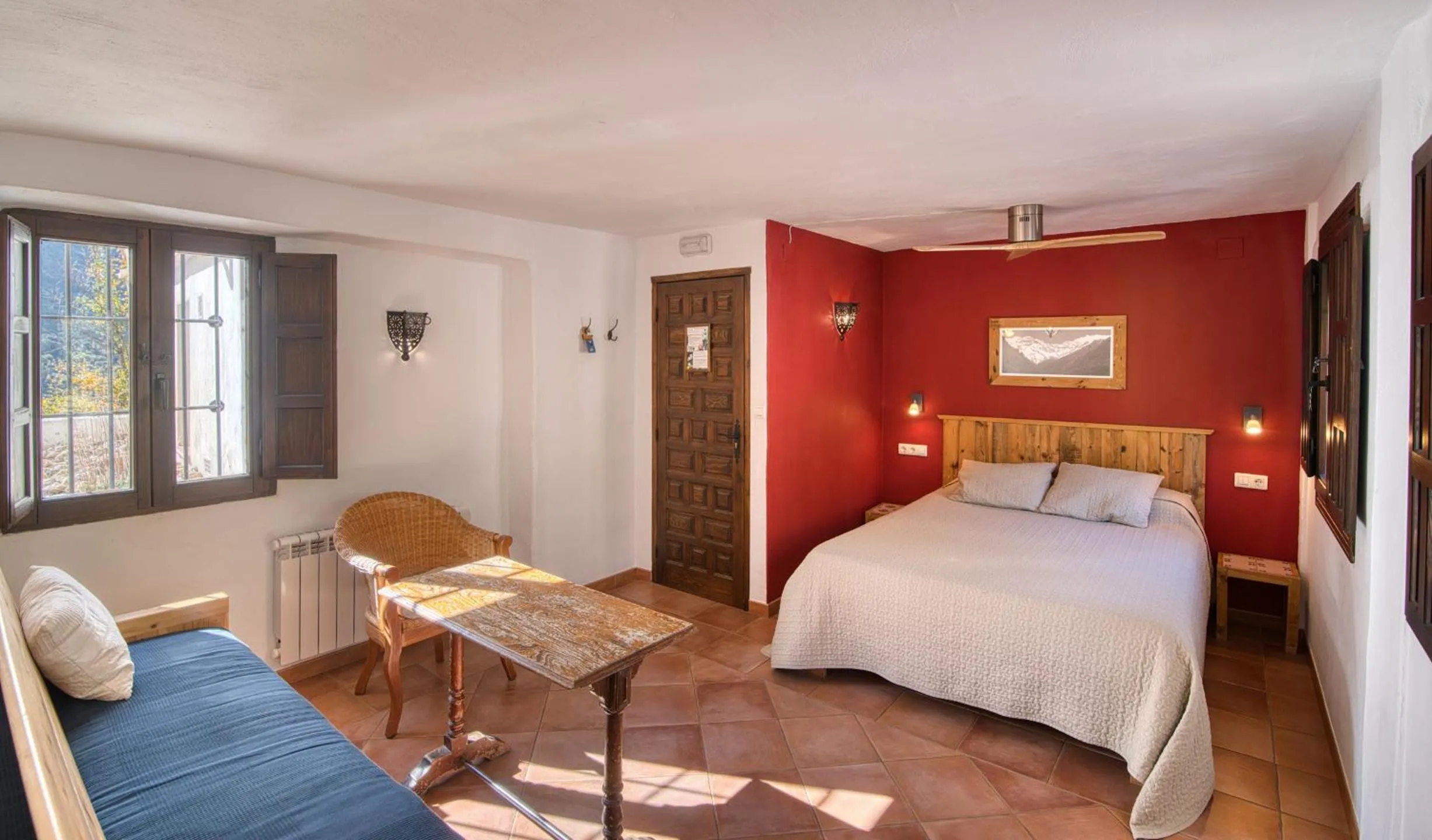 Bed in Casa Rural Arroyo de la Greda, your perfect base for activities in Sierra Nevada and Granada