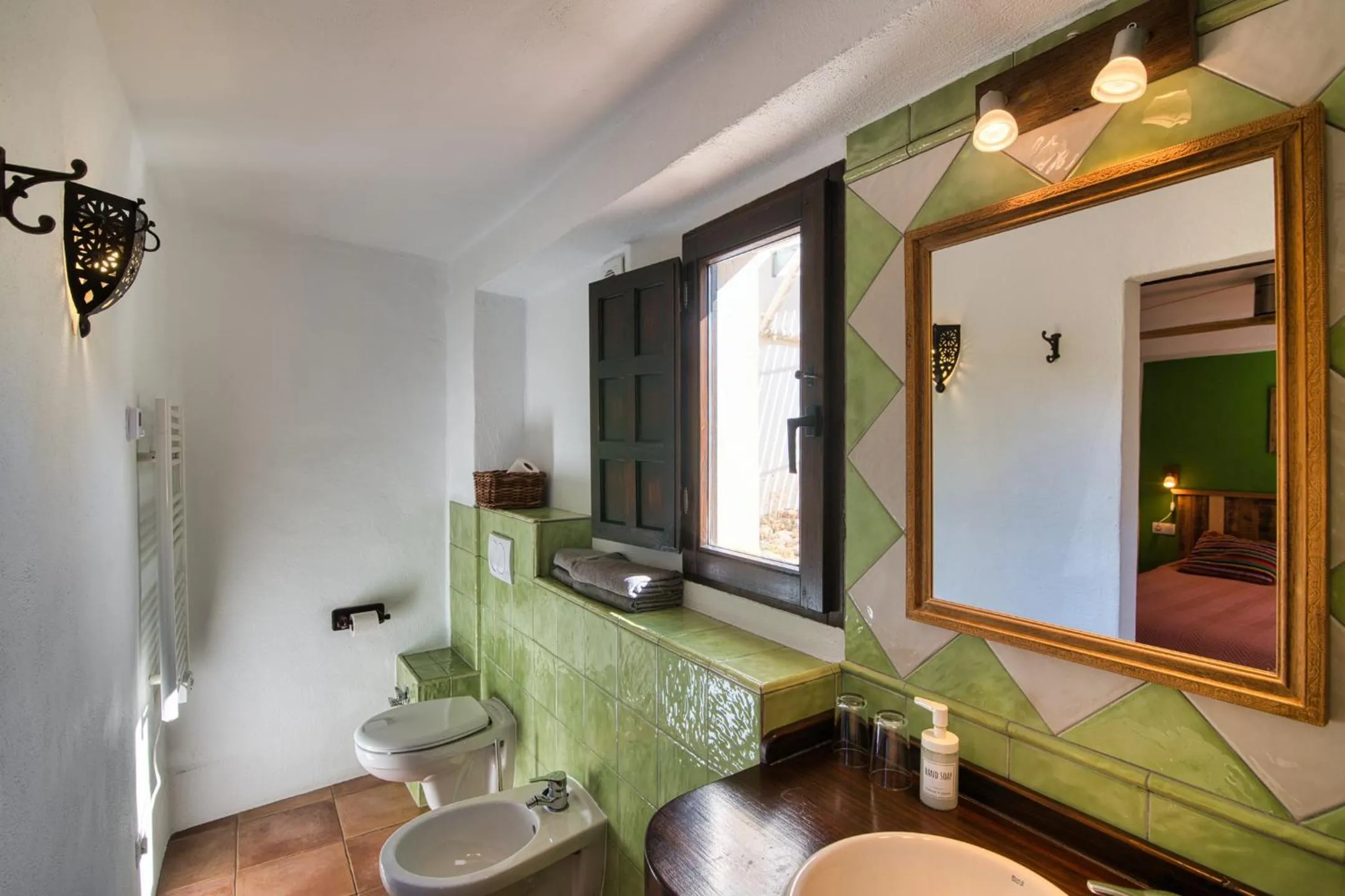 Toilet in Casa Rural Arroyo de la Greda, your perfect base for activities in Sierra Nevada and Granada