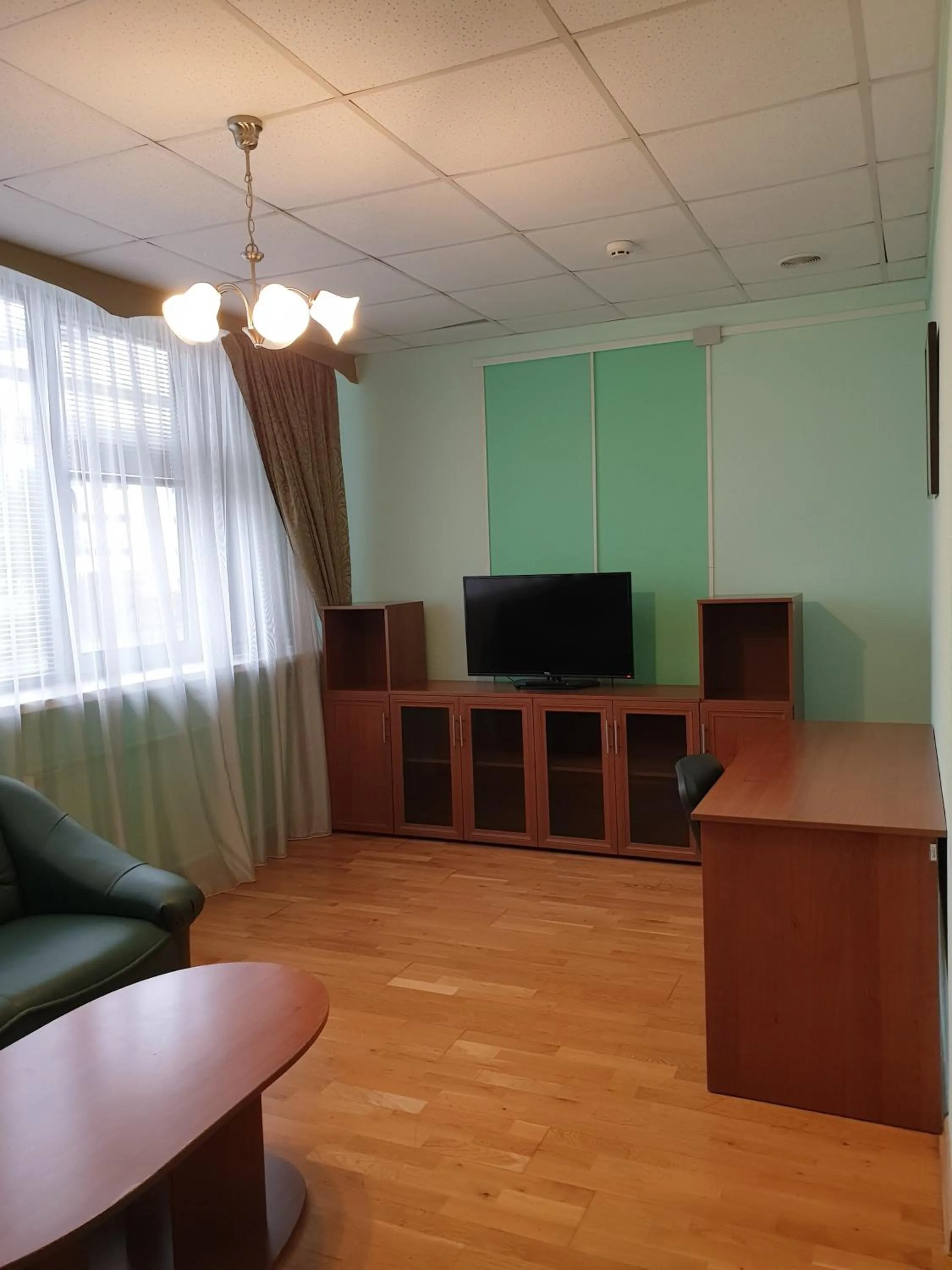 Communal lounge/ TV room in Hotel Obolon-Arena