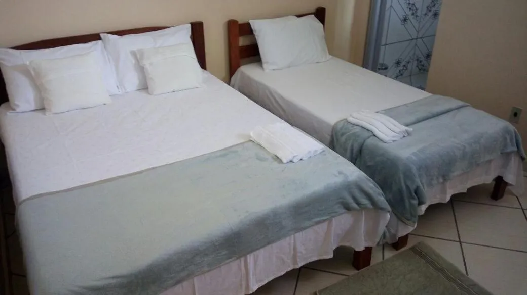 Bed in Pousada Recanto Maguary