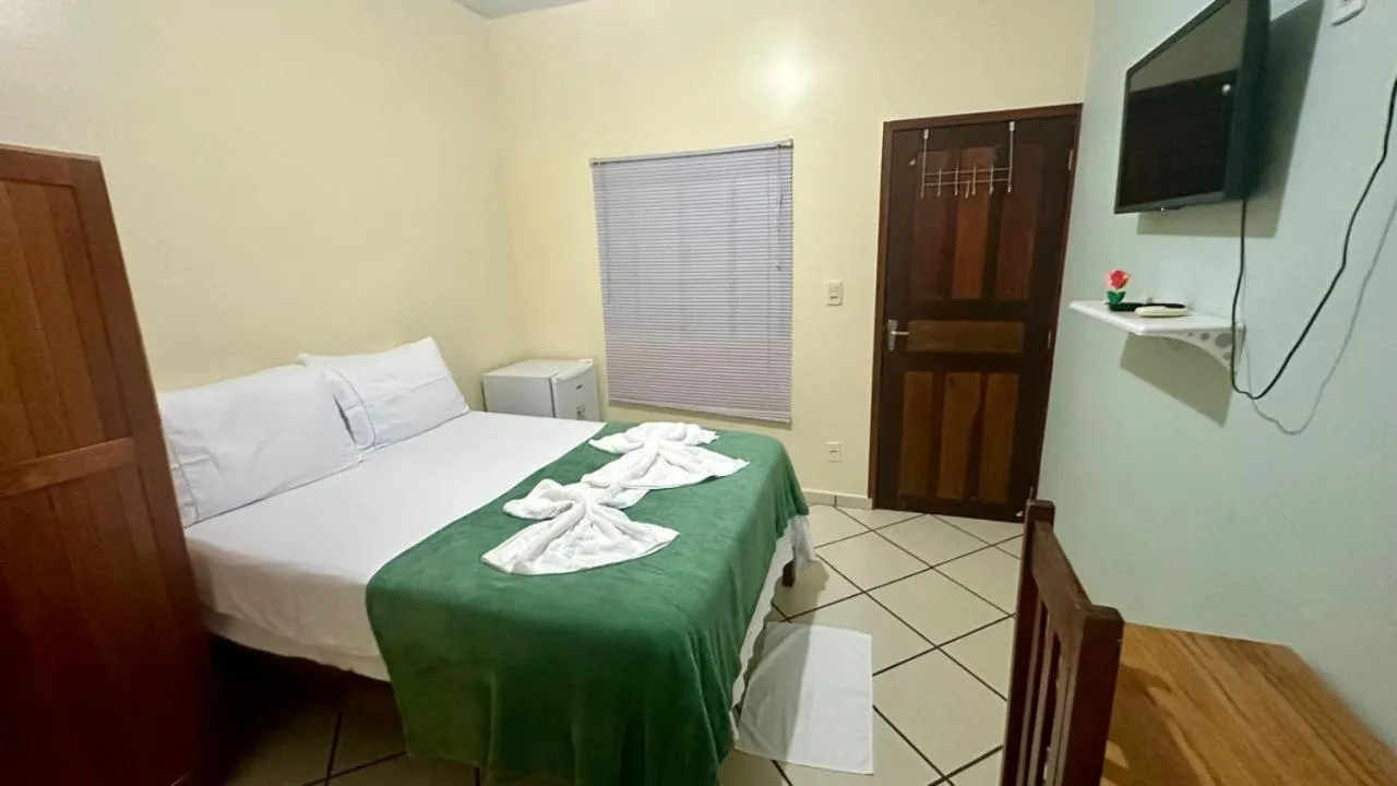 Bed in Pousada Recanto Maguary