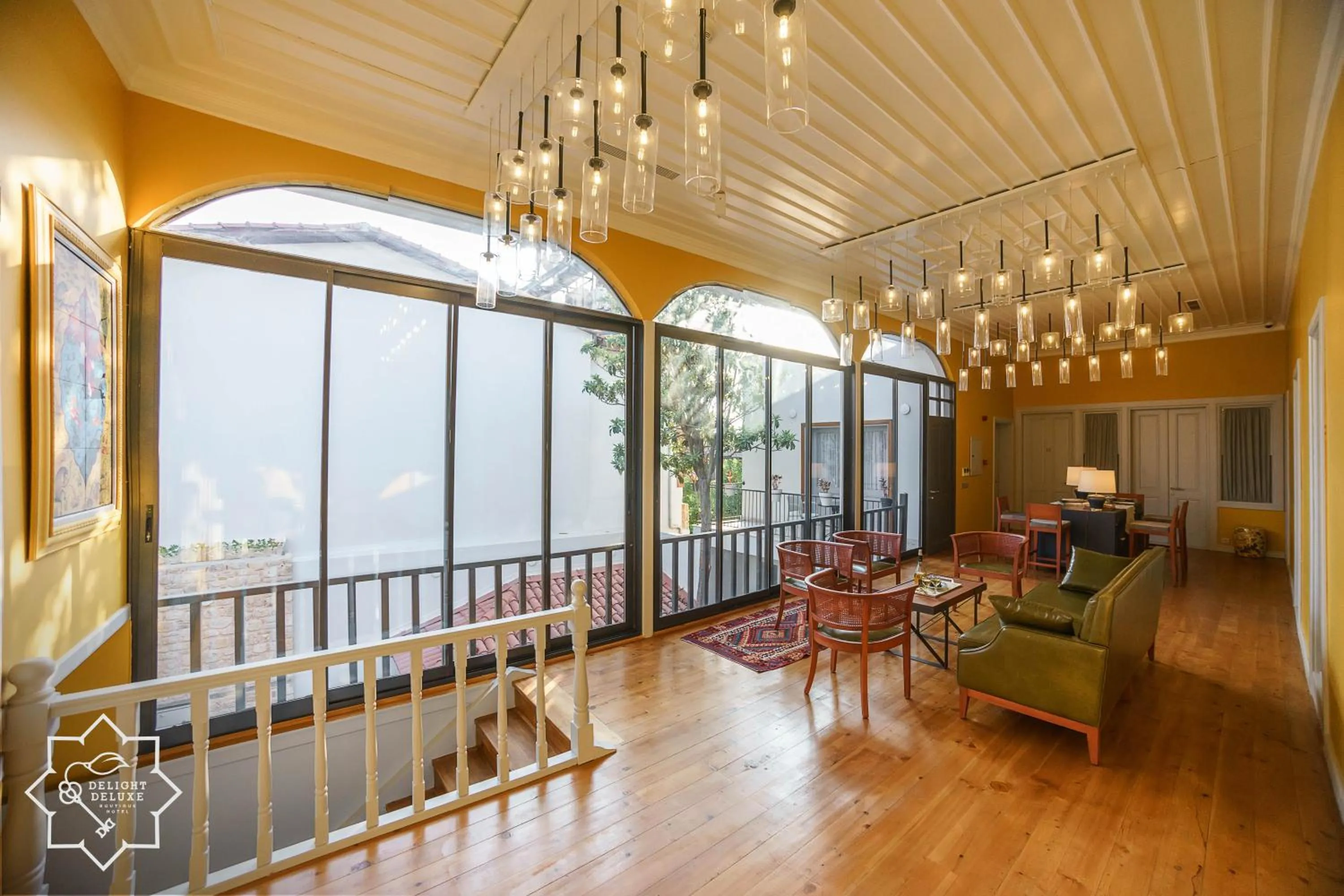 Communal lounge/ TV room in Delight Deluxe Hotel