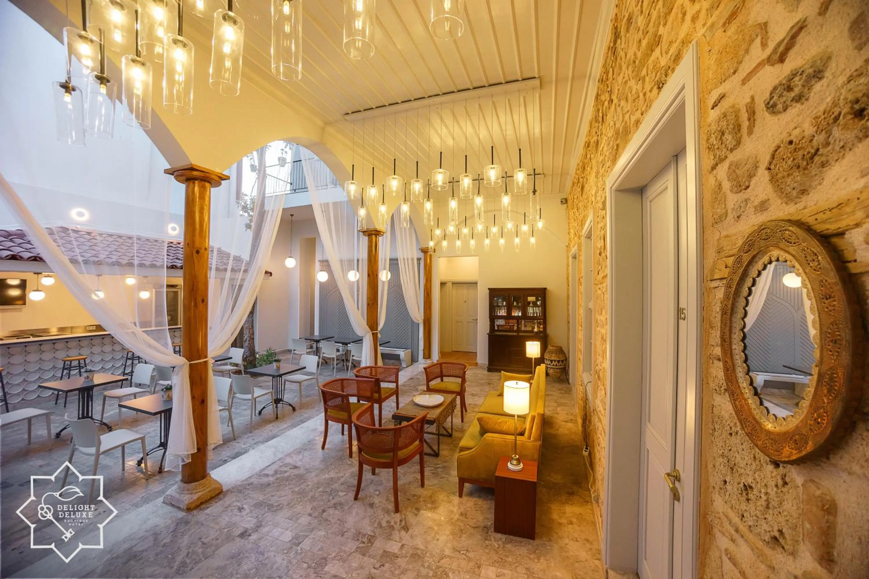 Communal lounge/ TV room in Delight Deluxe Hotel