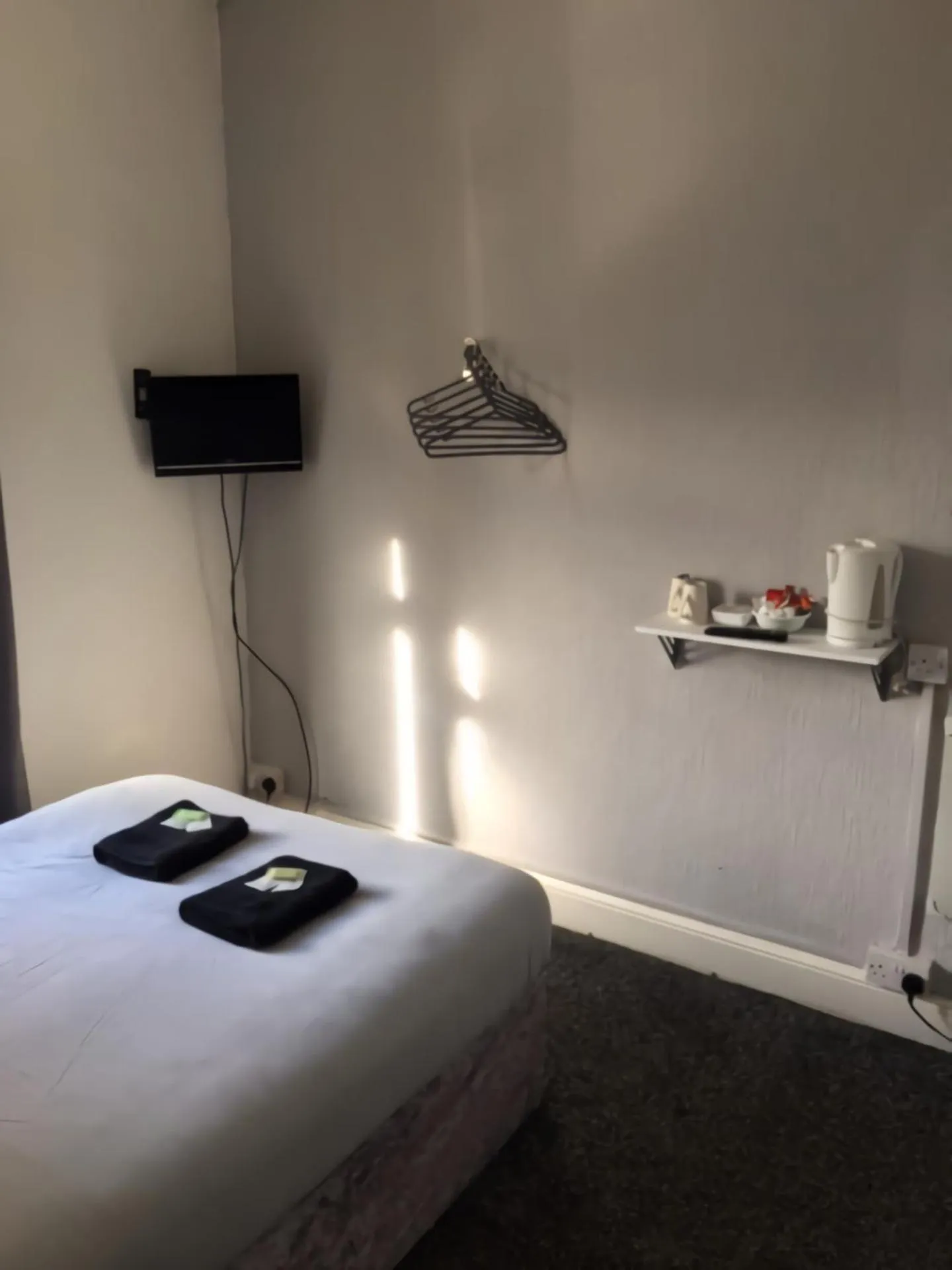 Bed in MyRoomz Seaview Hotel