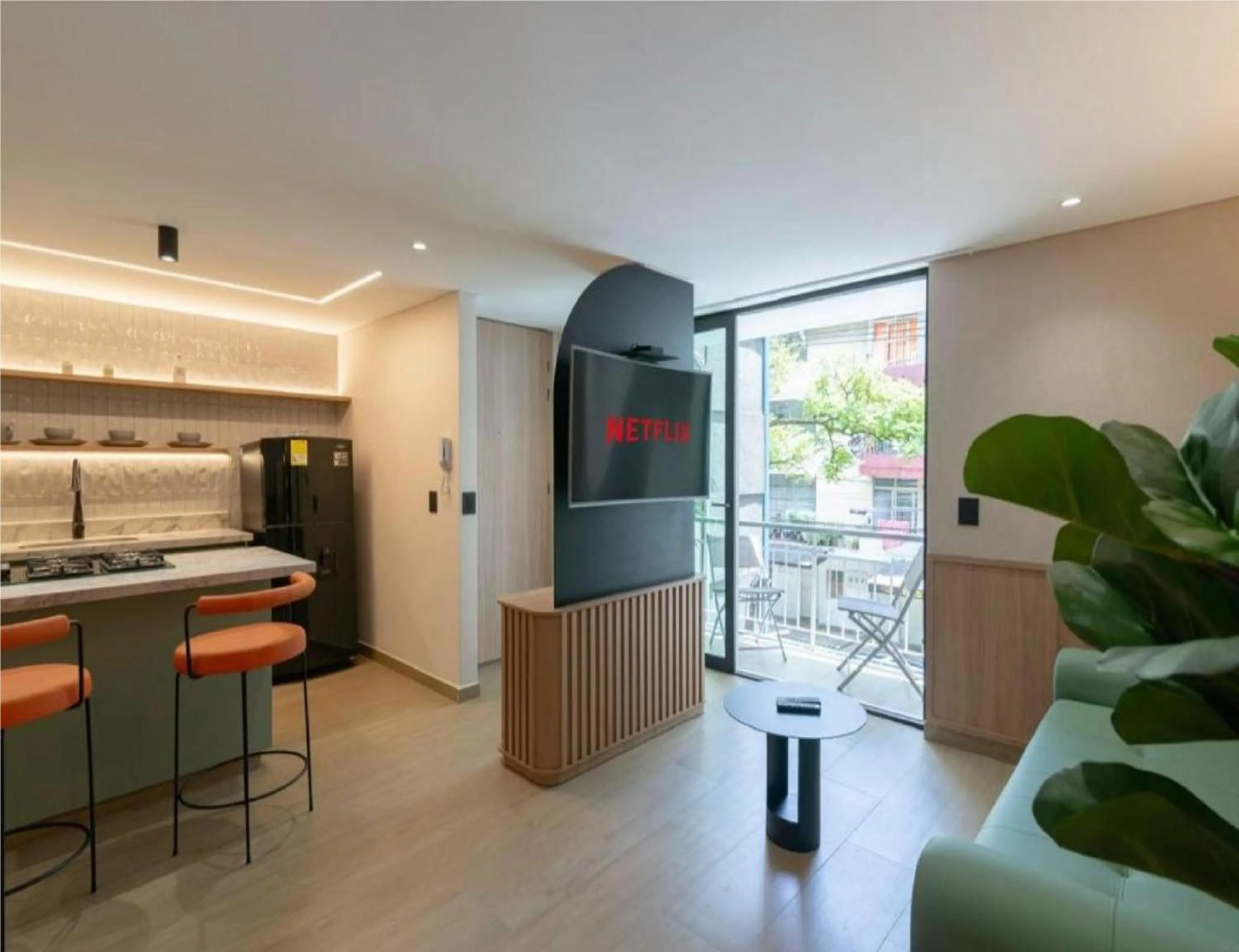 Communal lounge/ TV room in Obo Hotel