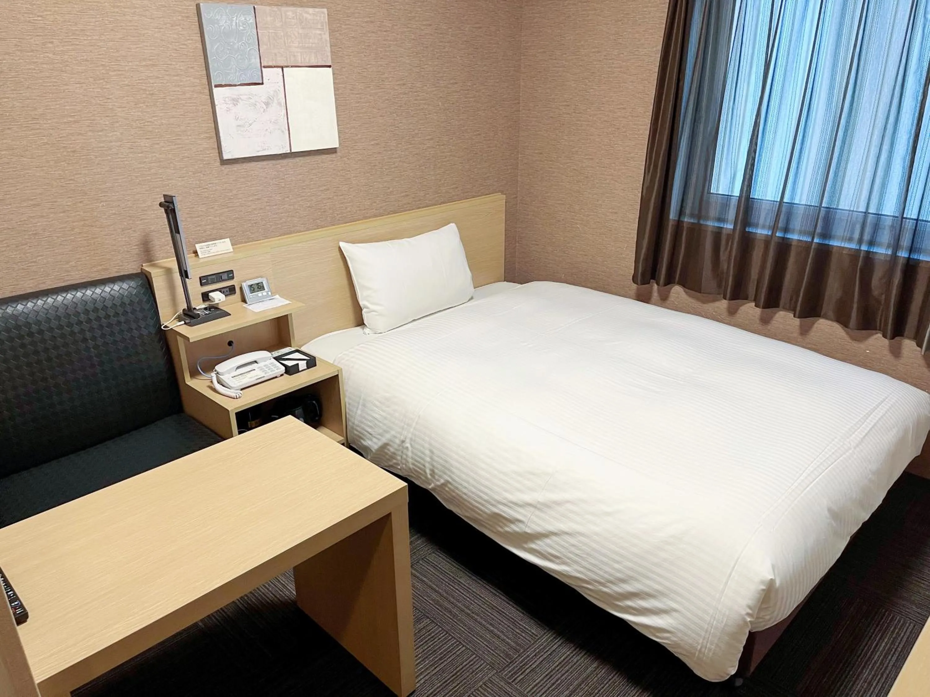 Photo of the whole room, Bed in Hotel Route-Inn Toyohashi Ekimae