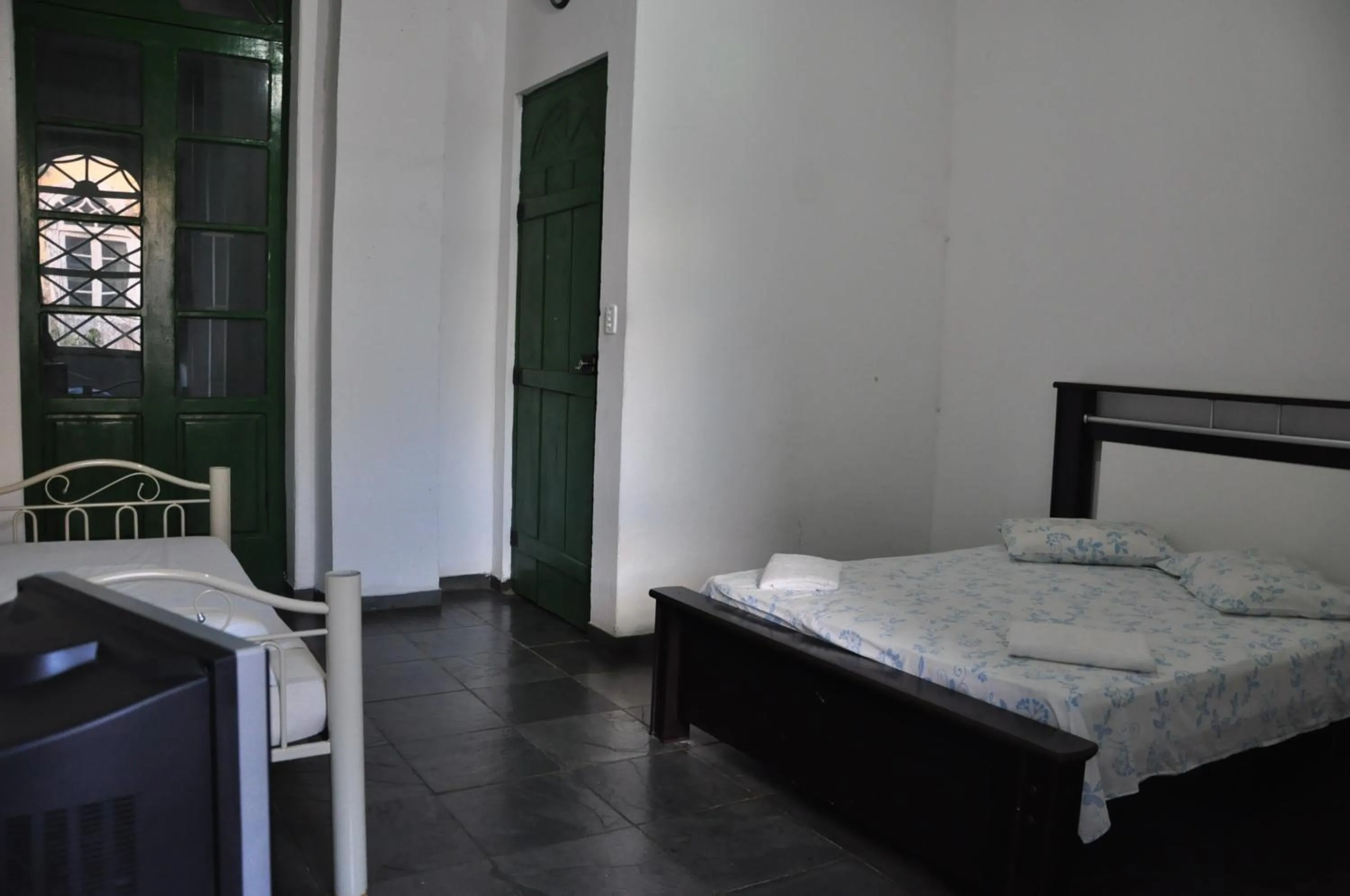 Bed in Pousada Solar dos Romanos