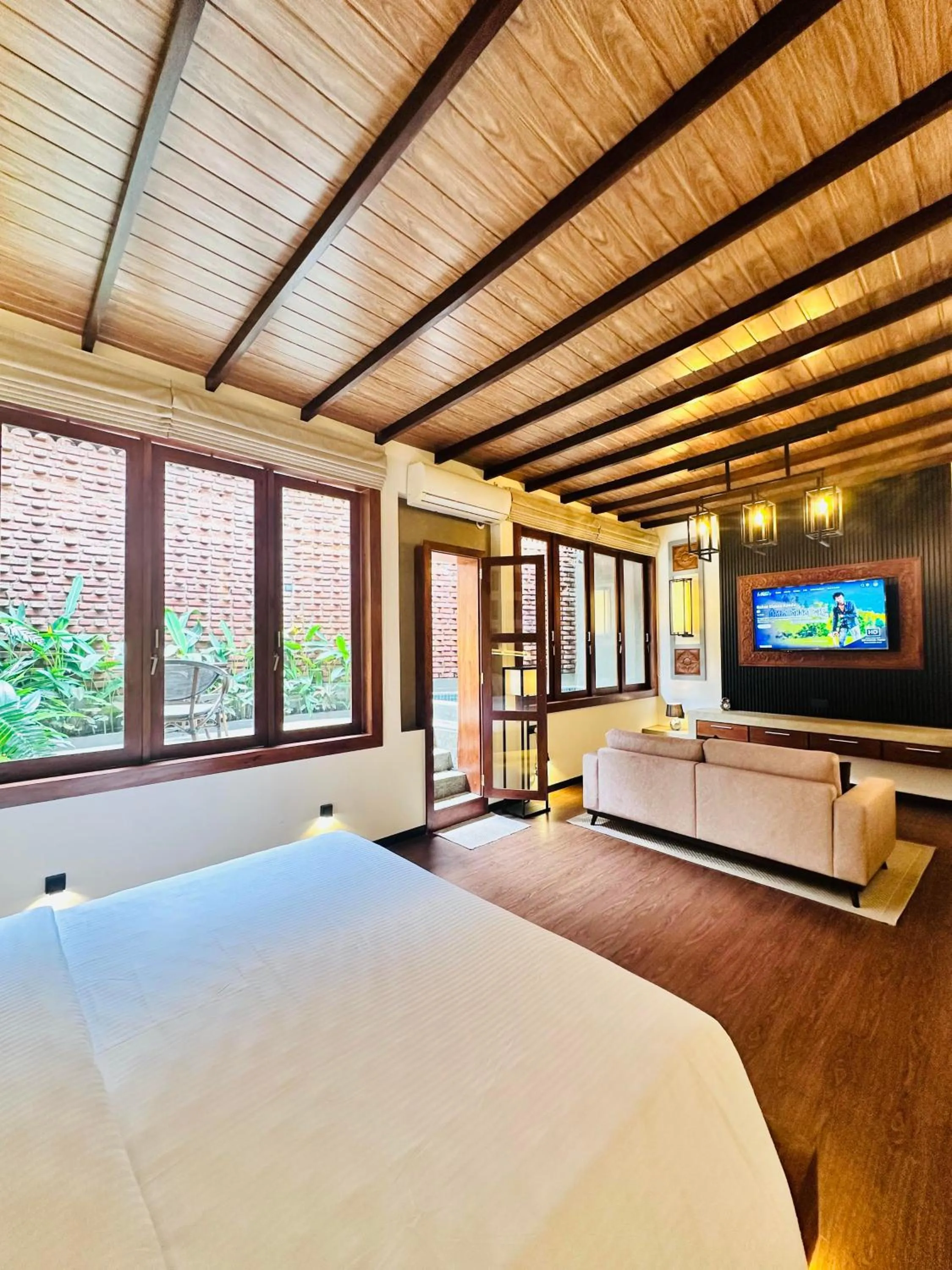 Communal lounge/ TV room, Bed in Kubura Resort