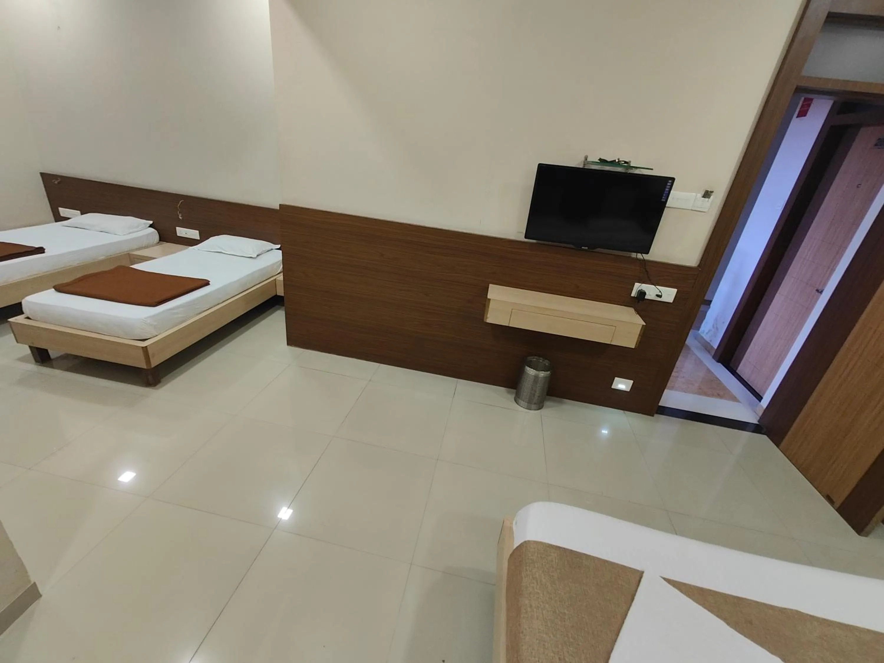 Bed in Hotel Midtown Inn