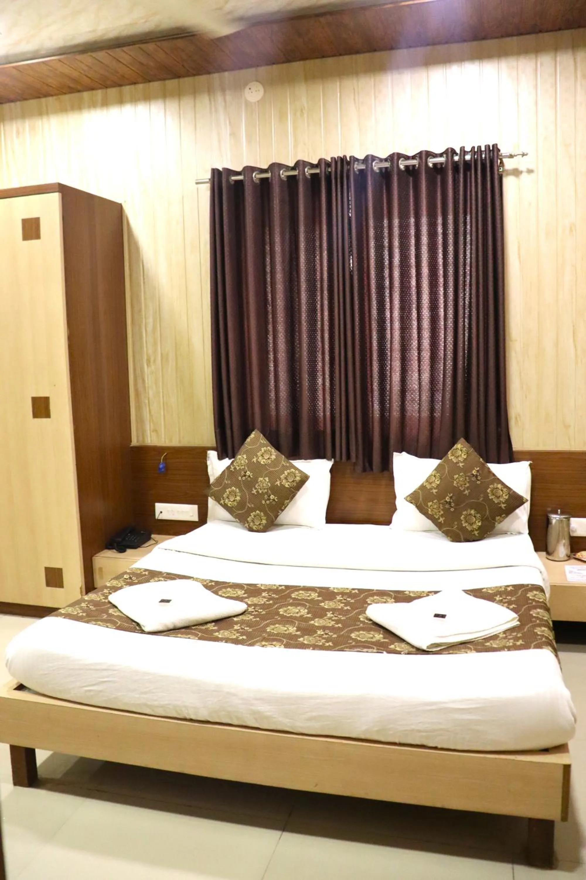 Bed in Hotel Midtown Inn