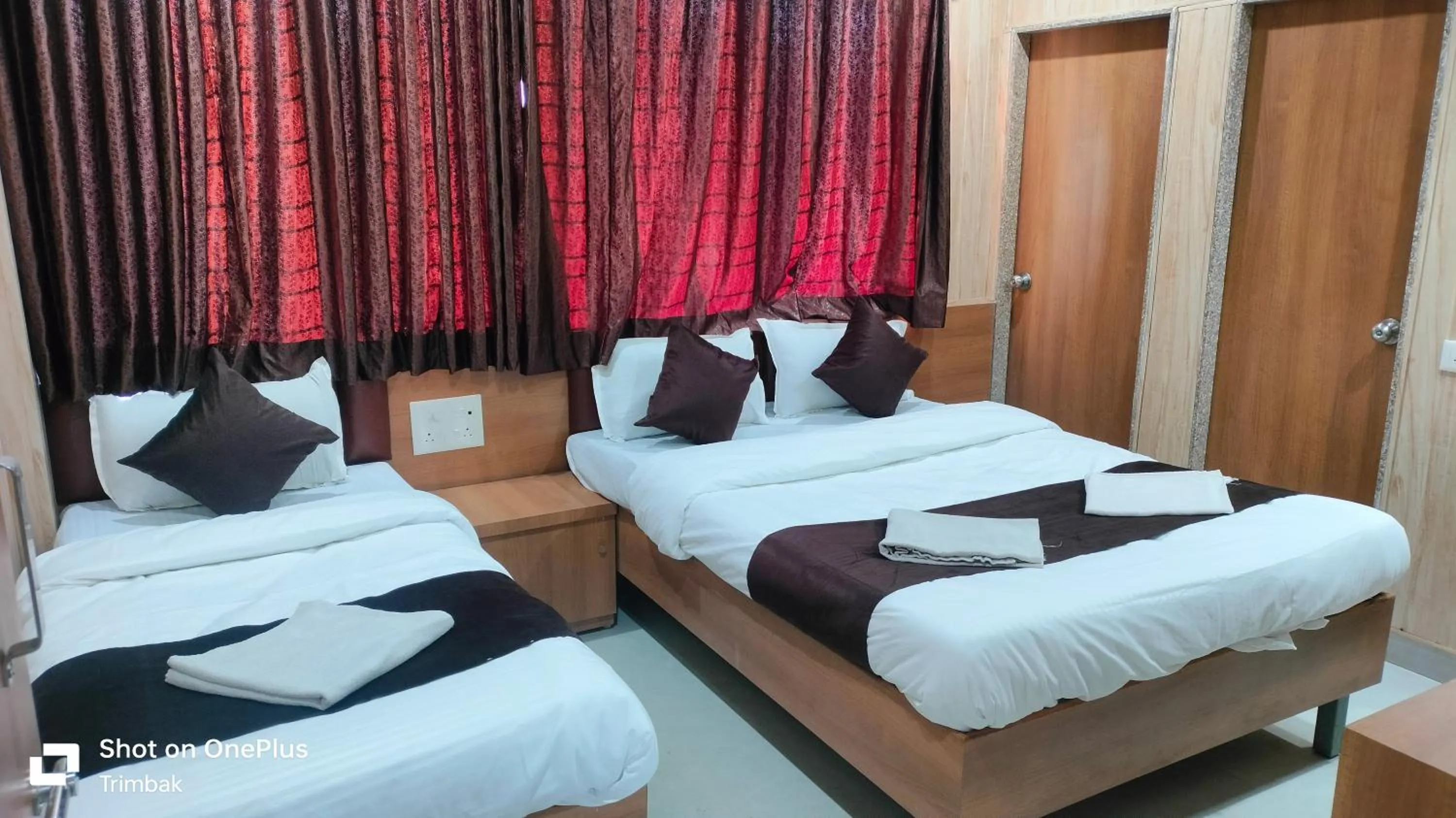 Bed in Hotel Midtown Inn