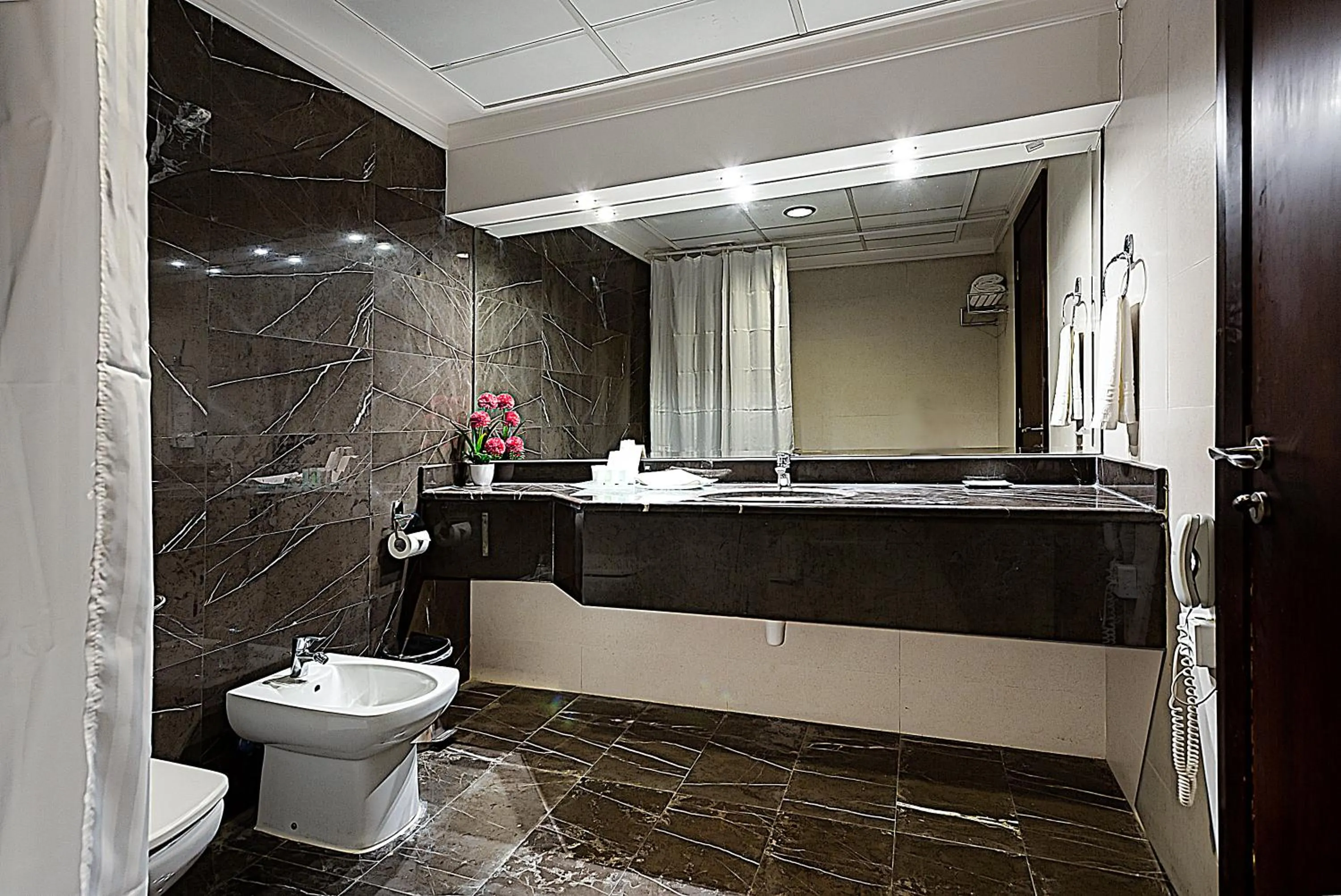 Bathroom in Monroe Hotel & Suites