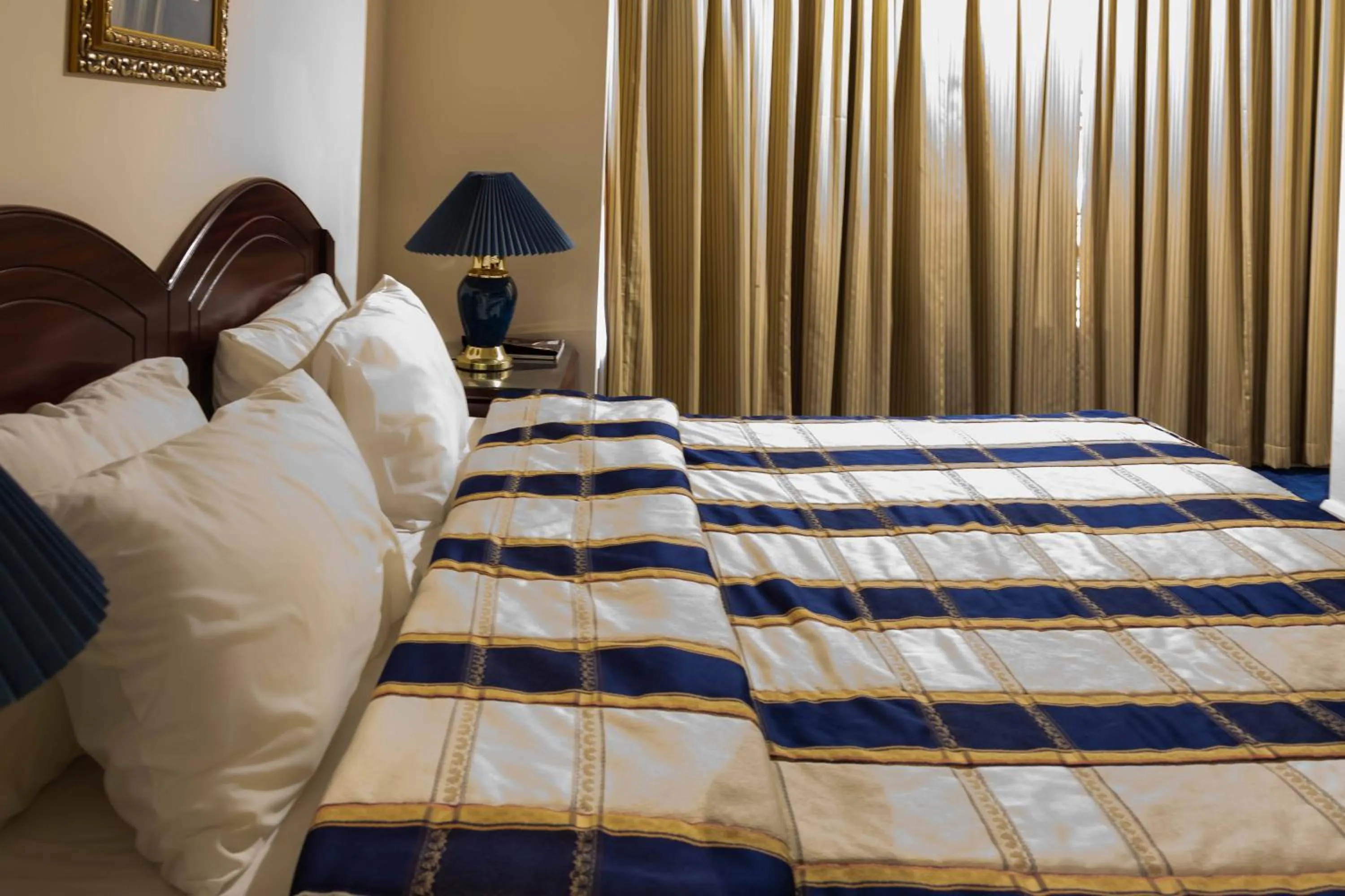 Bed in Mansouri Mansions Hotel
