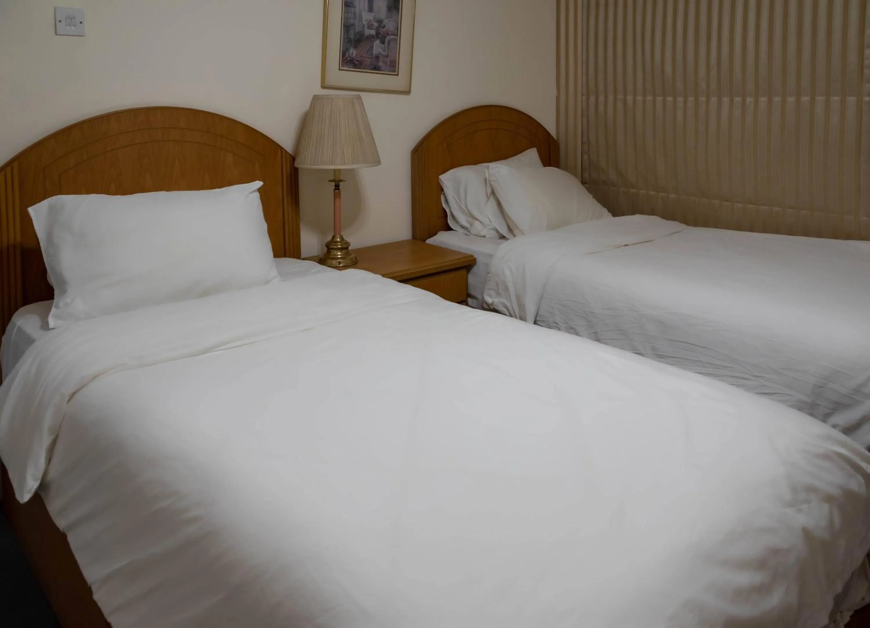 Bed in Mansouri Mansions Hotel