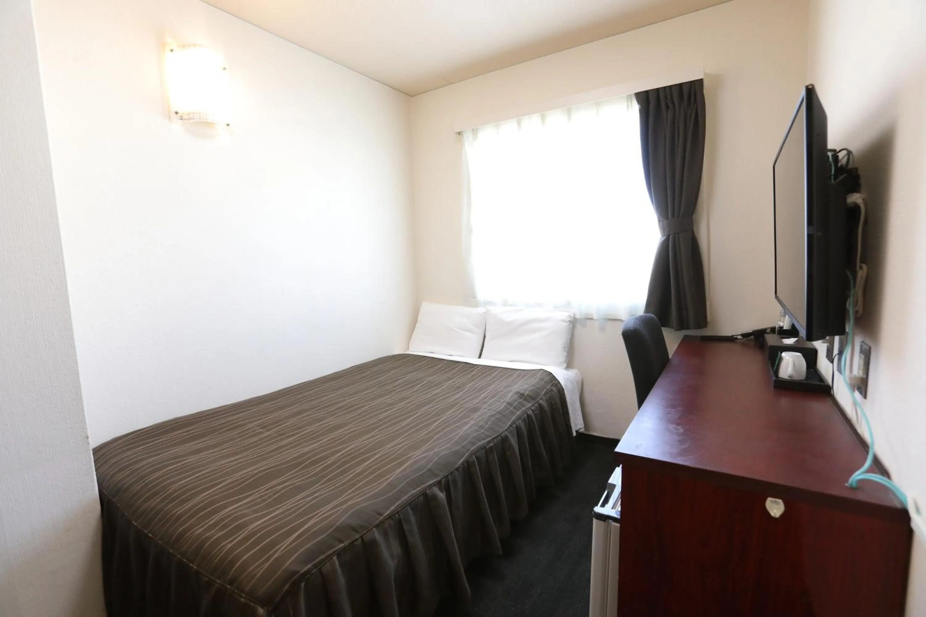 Photo of the whole room, Bed in Osaka Corona Hotel