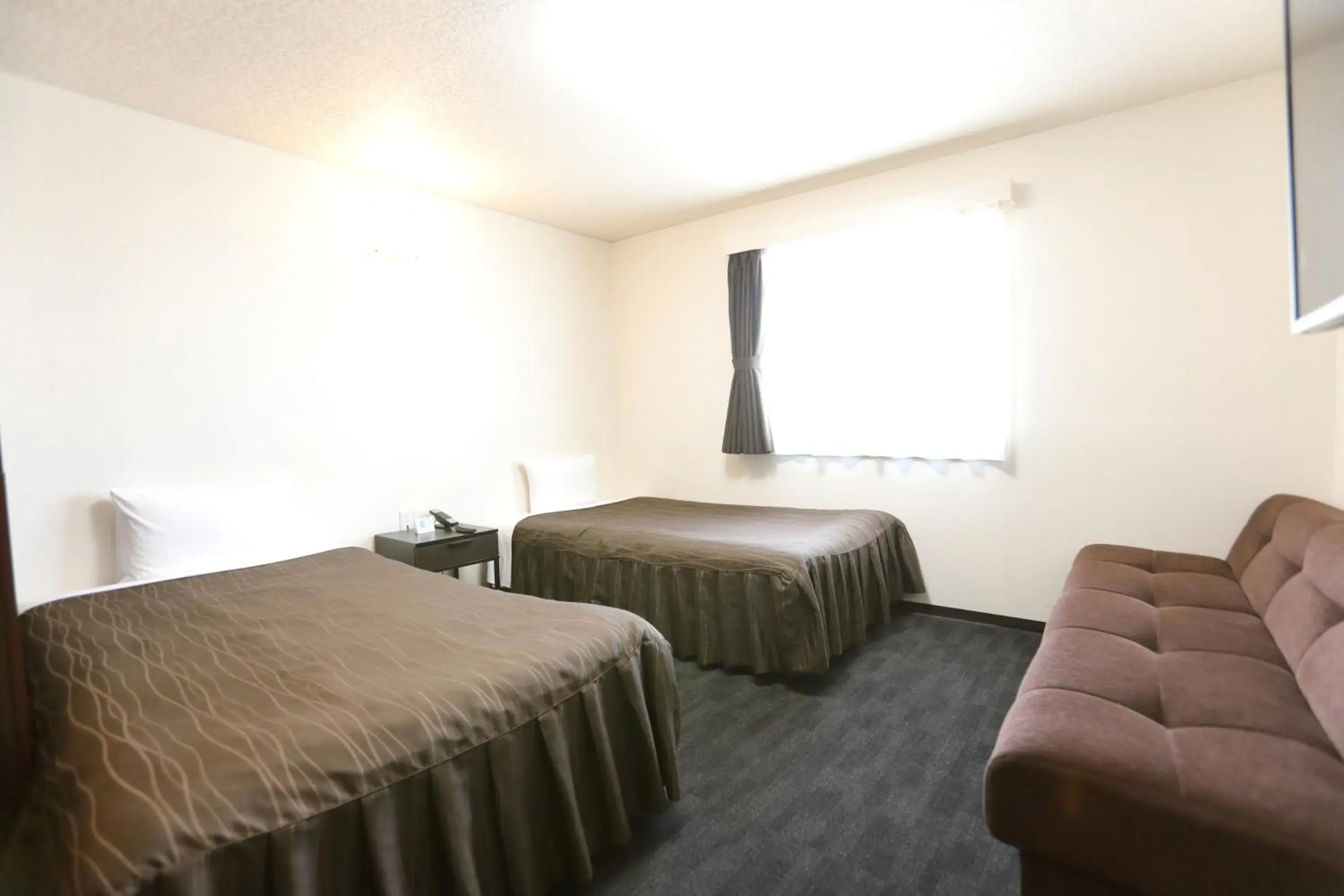 Photo of the whole room, Bed in Osaka Corona Hotel Photo of the whole room, Bed in Osaka Corona Hotel