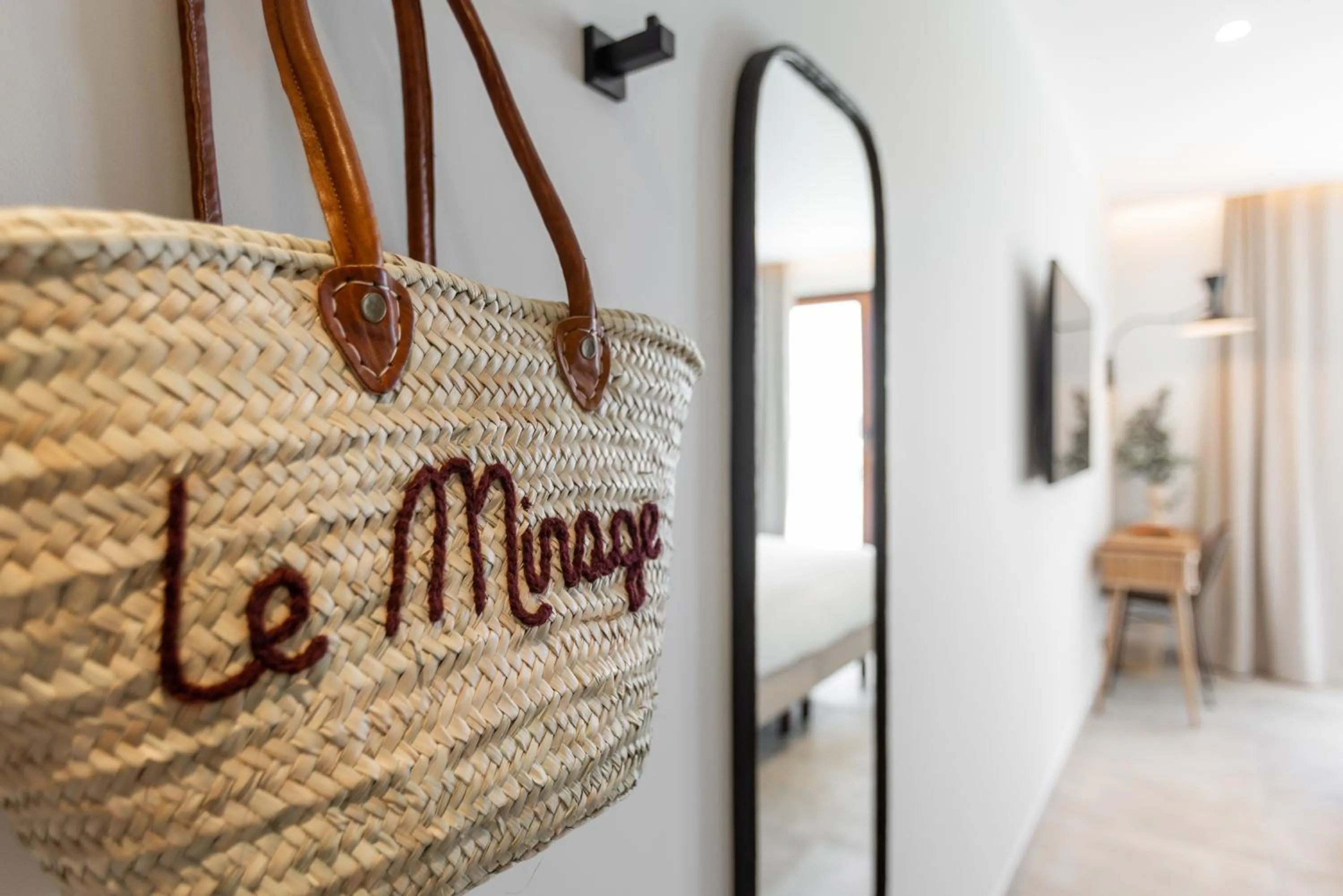 Property logo or sign in Le Mirage