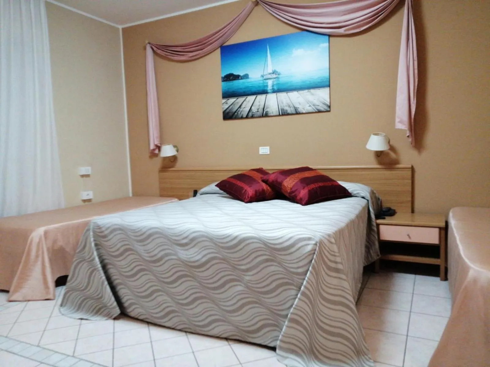 Bed in Hotel Acquario