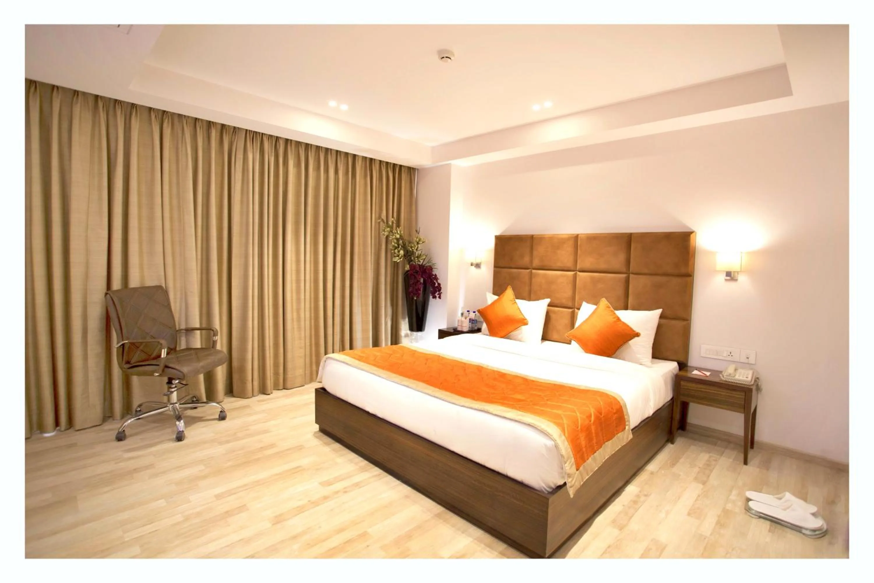 Photo of the whole room, Bed in Hotel Hampi International