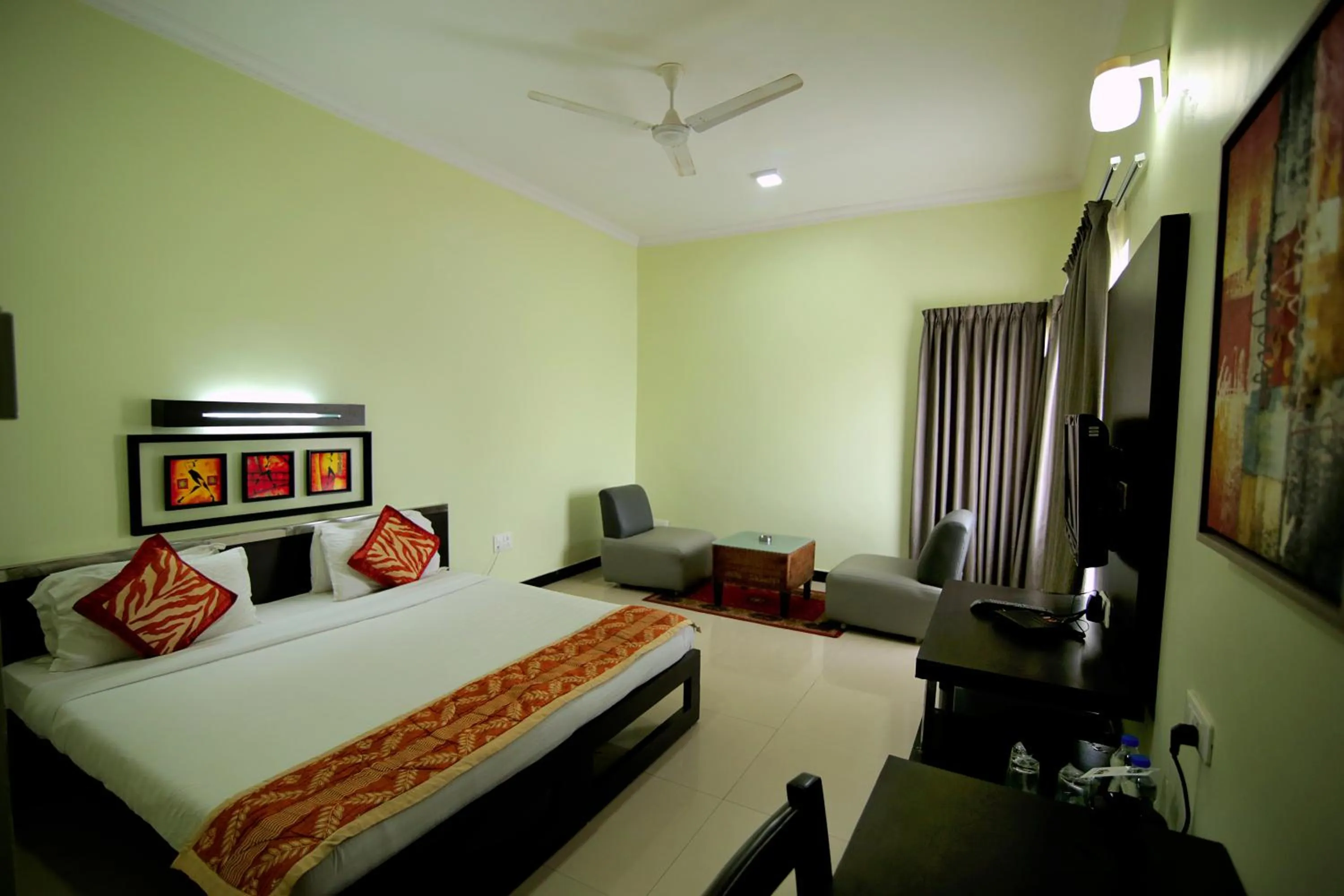 Photo of the whole room, Bed in Hotel Hampi International