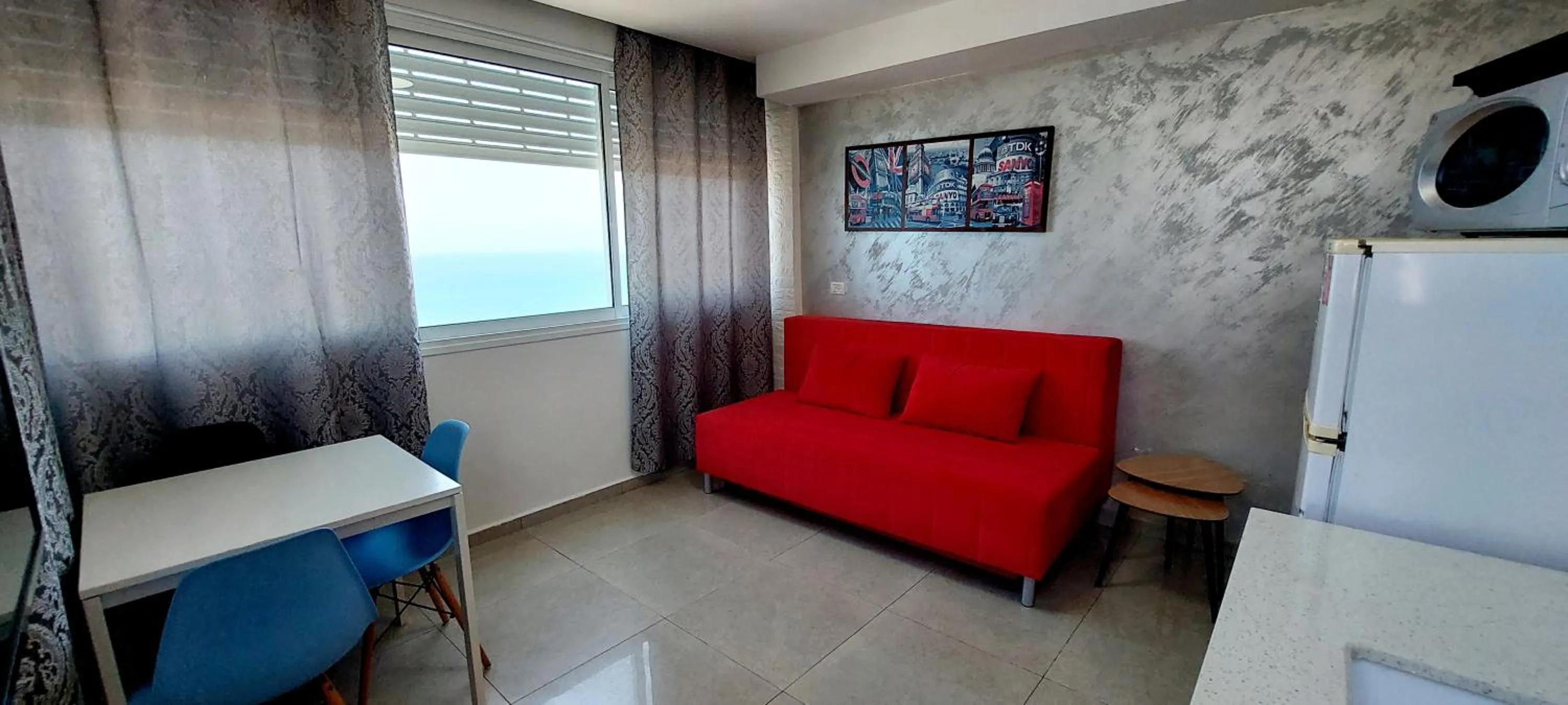 Seating area in 612 apartment on the beach