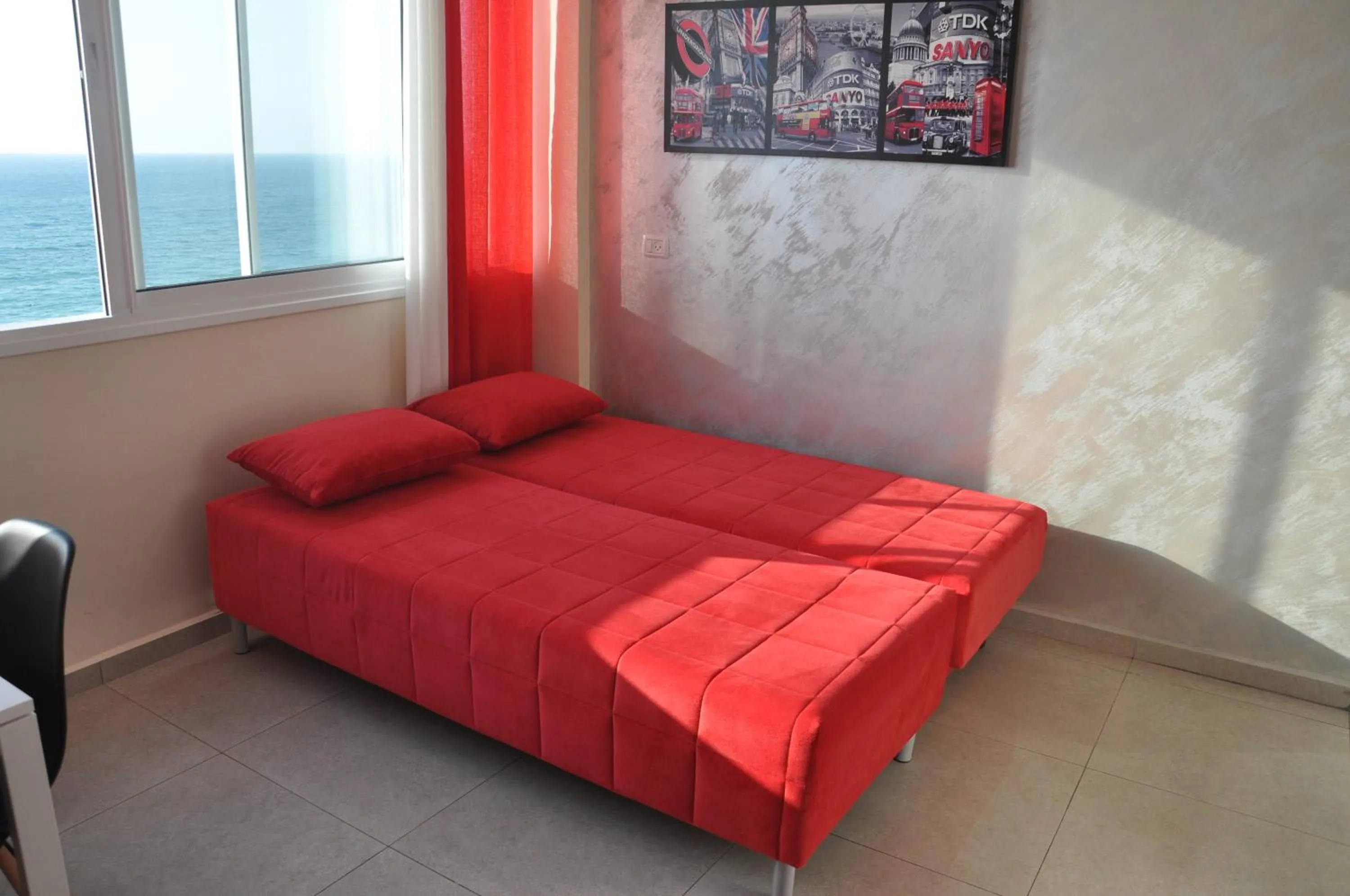 Bed in 612 apartment on the beach