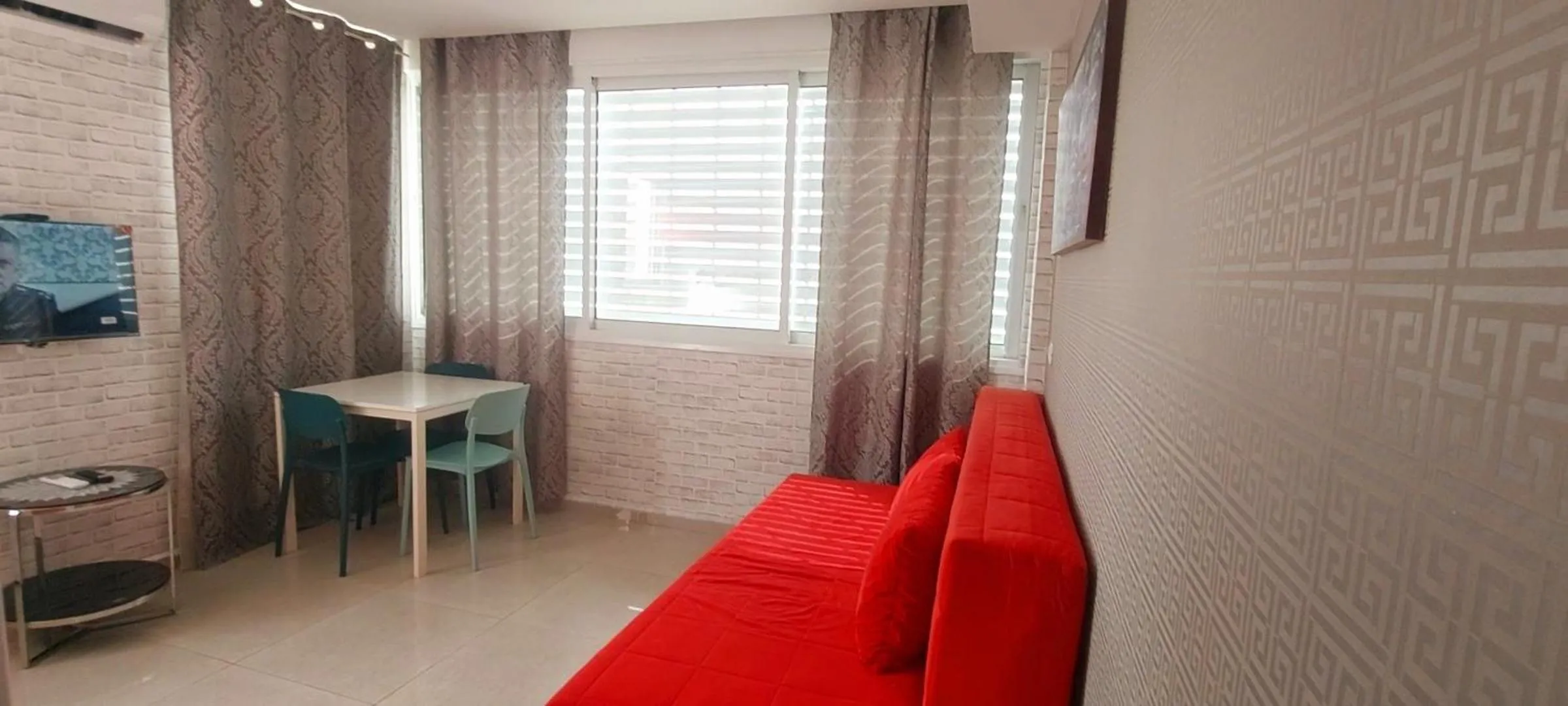 Seating area in 612 apartment on the beach