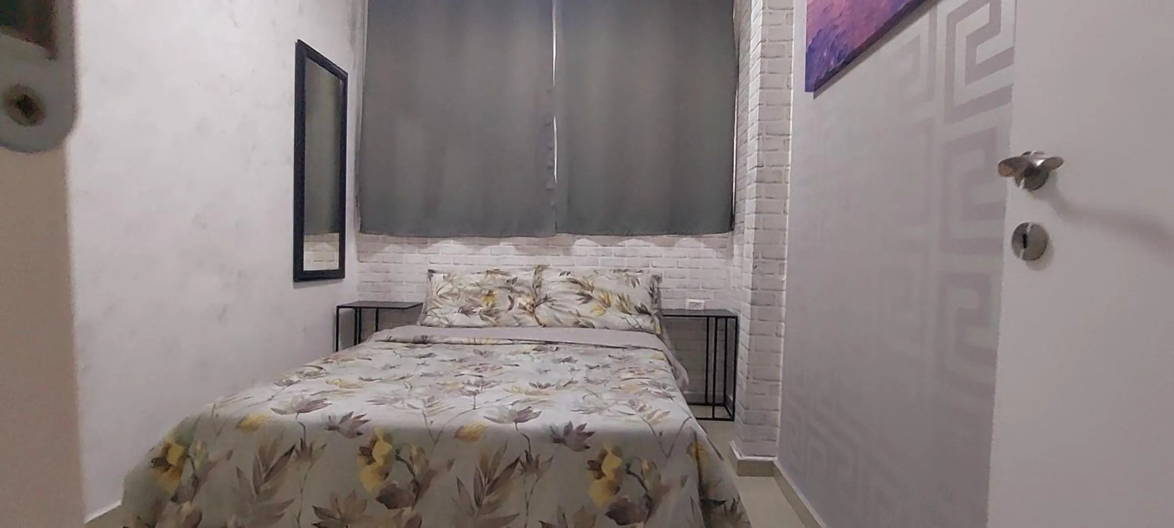 Bed in 612 apartment on the beach