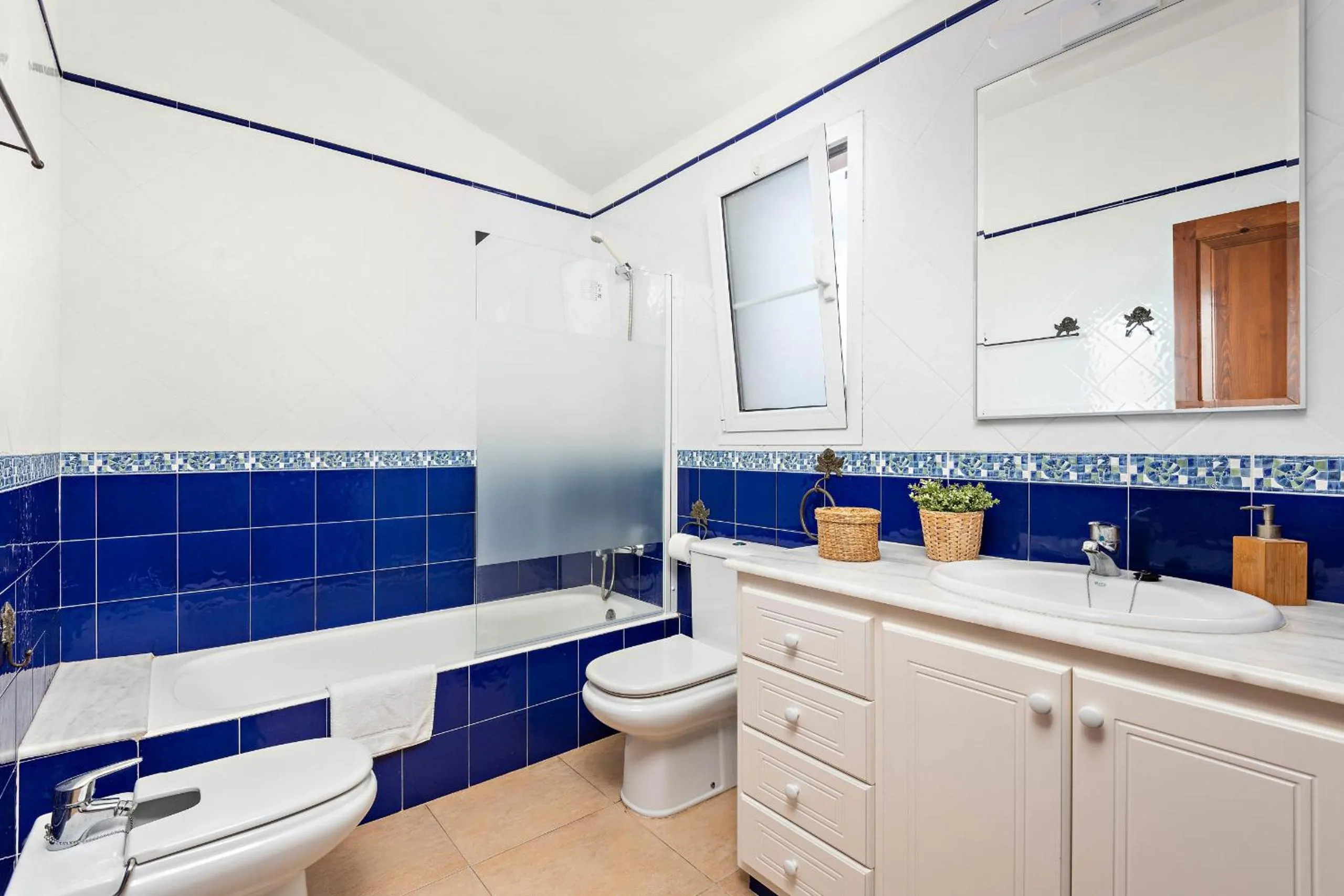 Bathroom in Villas Cala Galdana by Escape Home