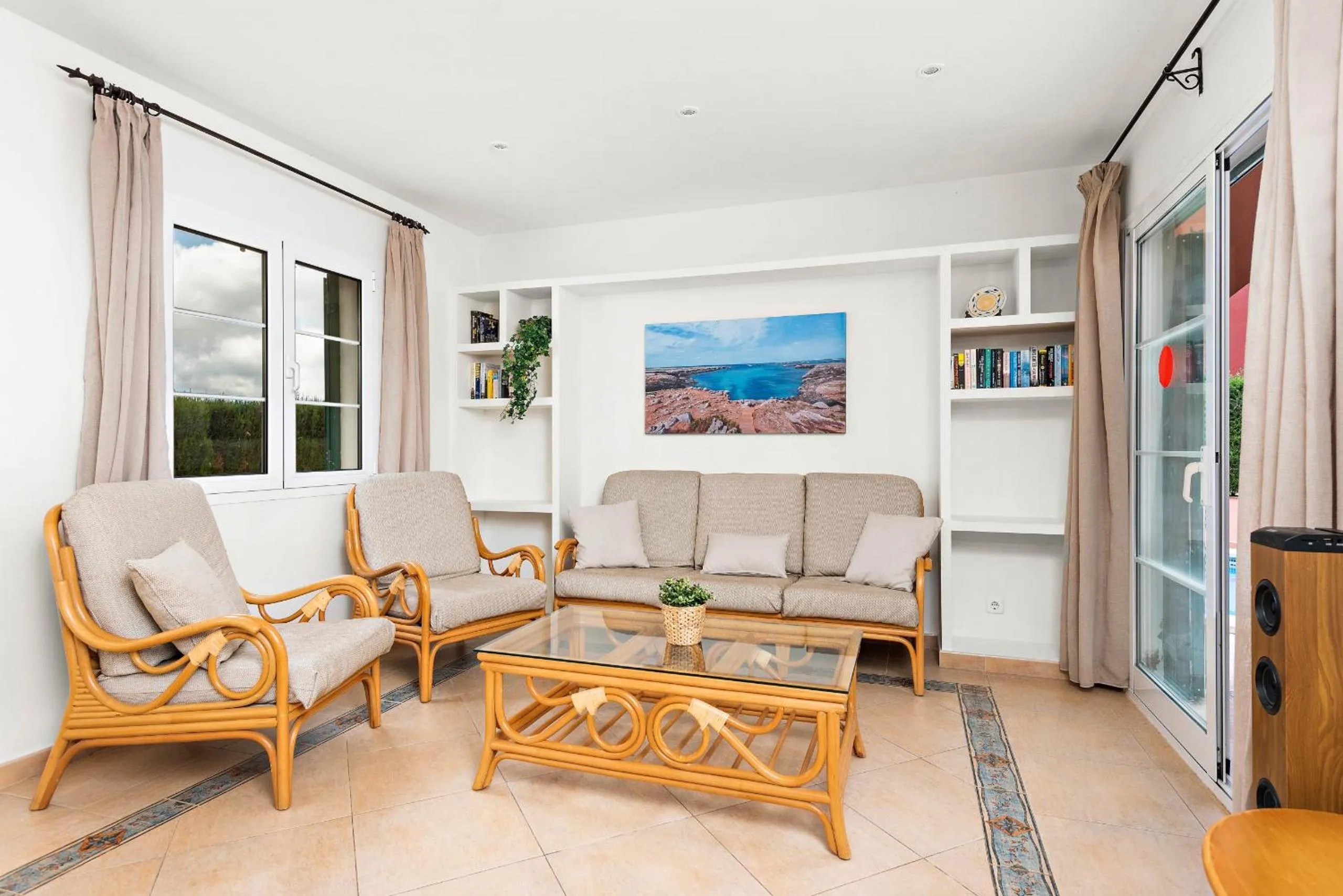 Communal lounge/ TV room in Villas Cala Galdana by Escape Home