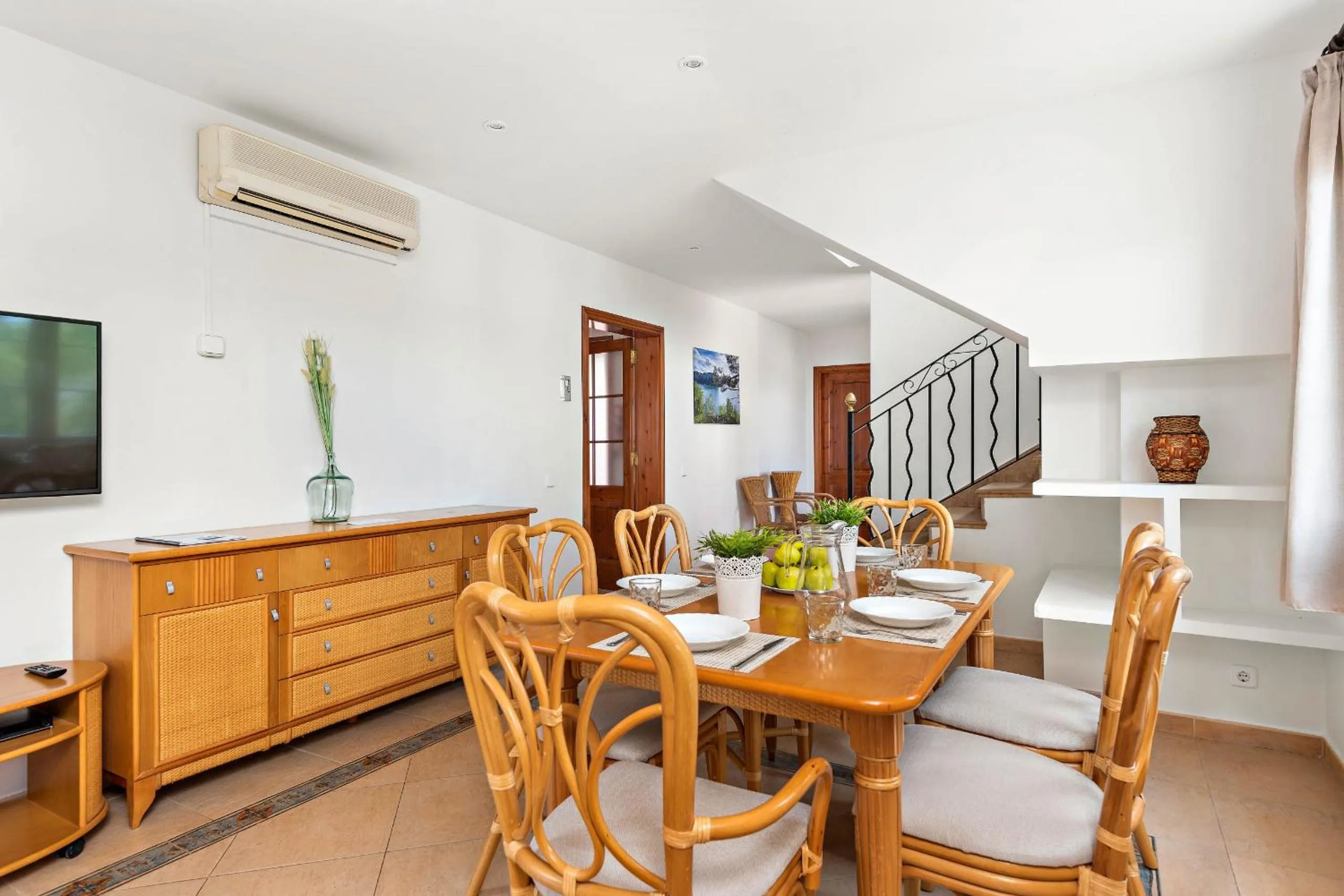 Dining area in Villas Cala Galdana by Escape Home