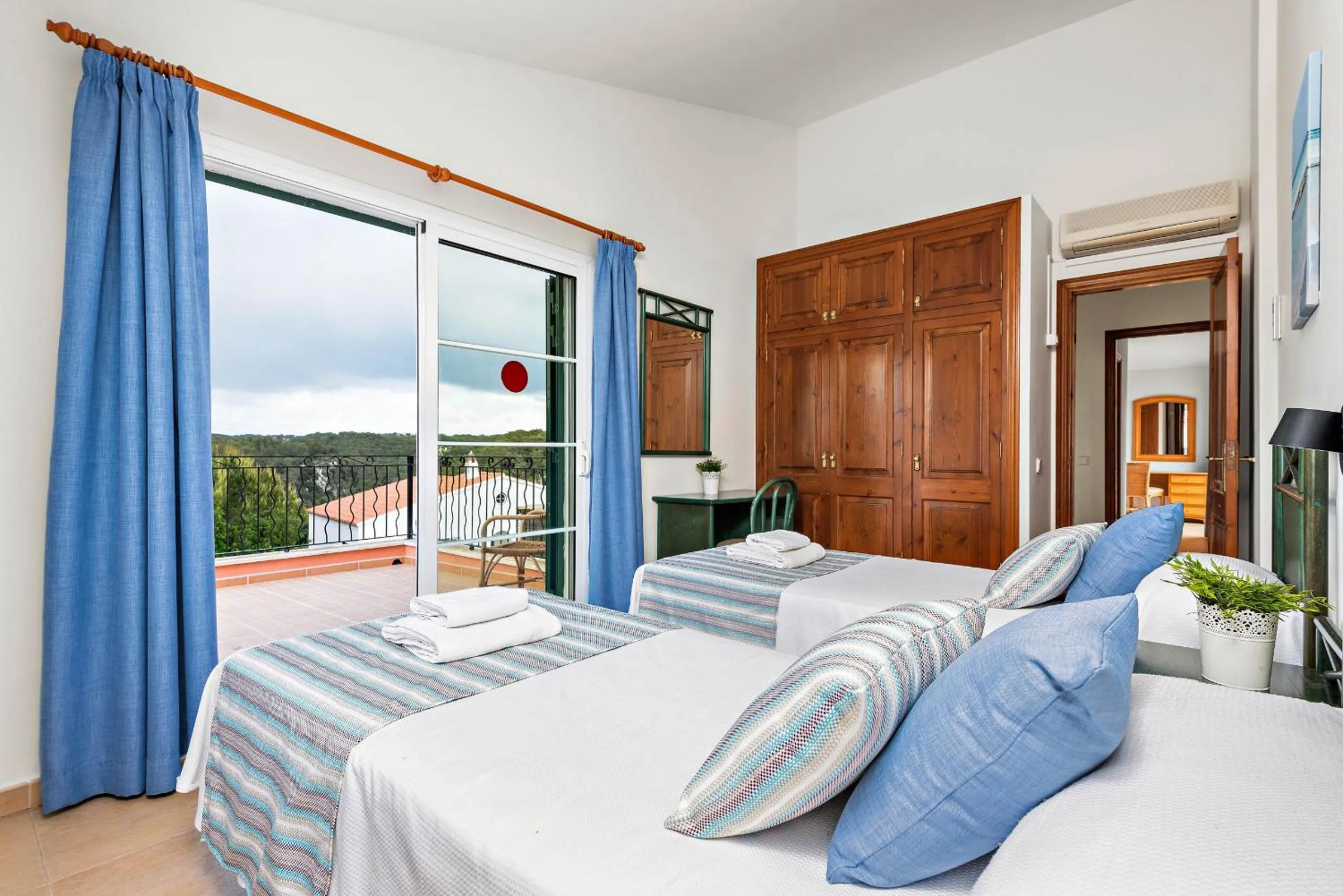 Bed in Villas Cala Galdana by Escape Home