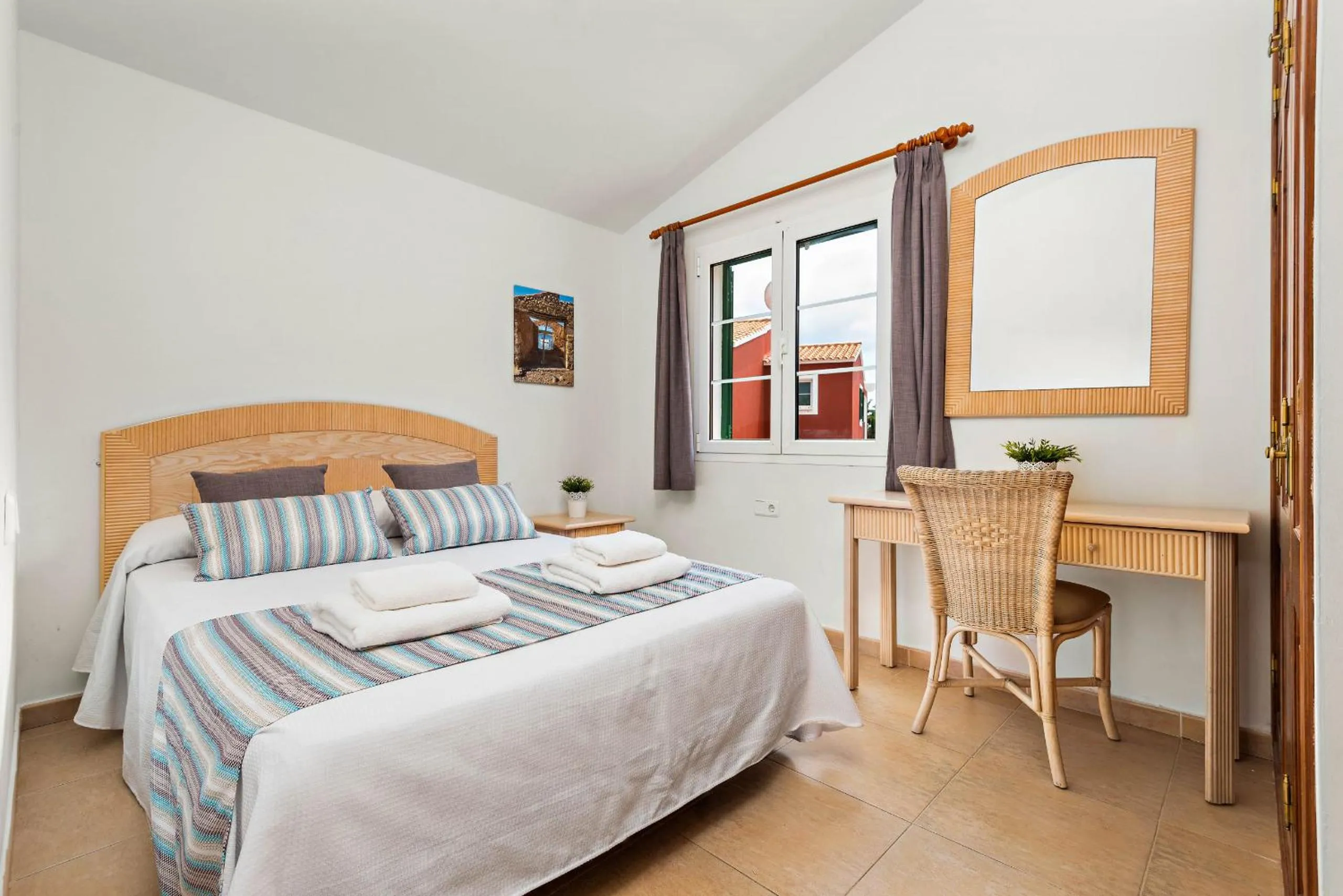 Bed in Villas Cala Galdana by Escape Home