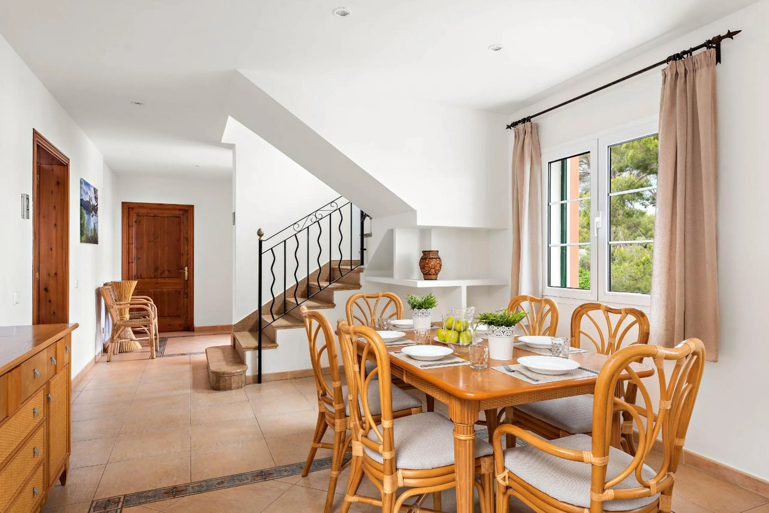Dining area in Villas Cala Galdana by Escape Home