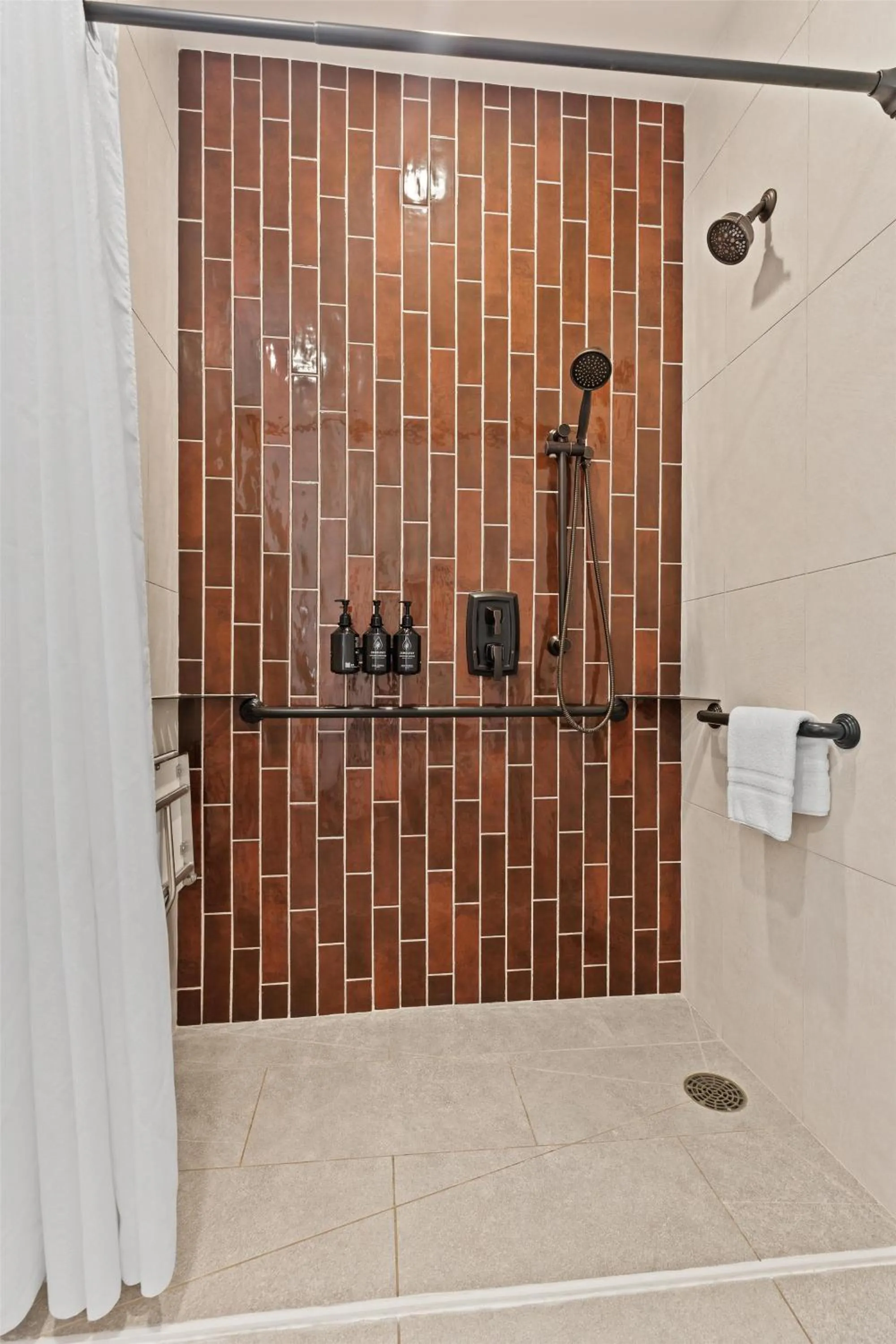 Bathroom in Hotel De Novo Springdale, Tapestry Collection by Hilton