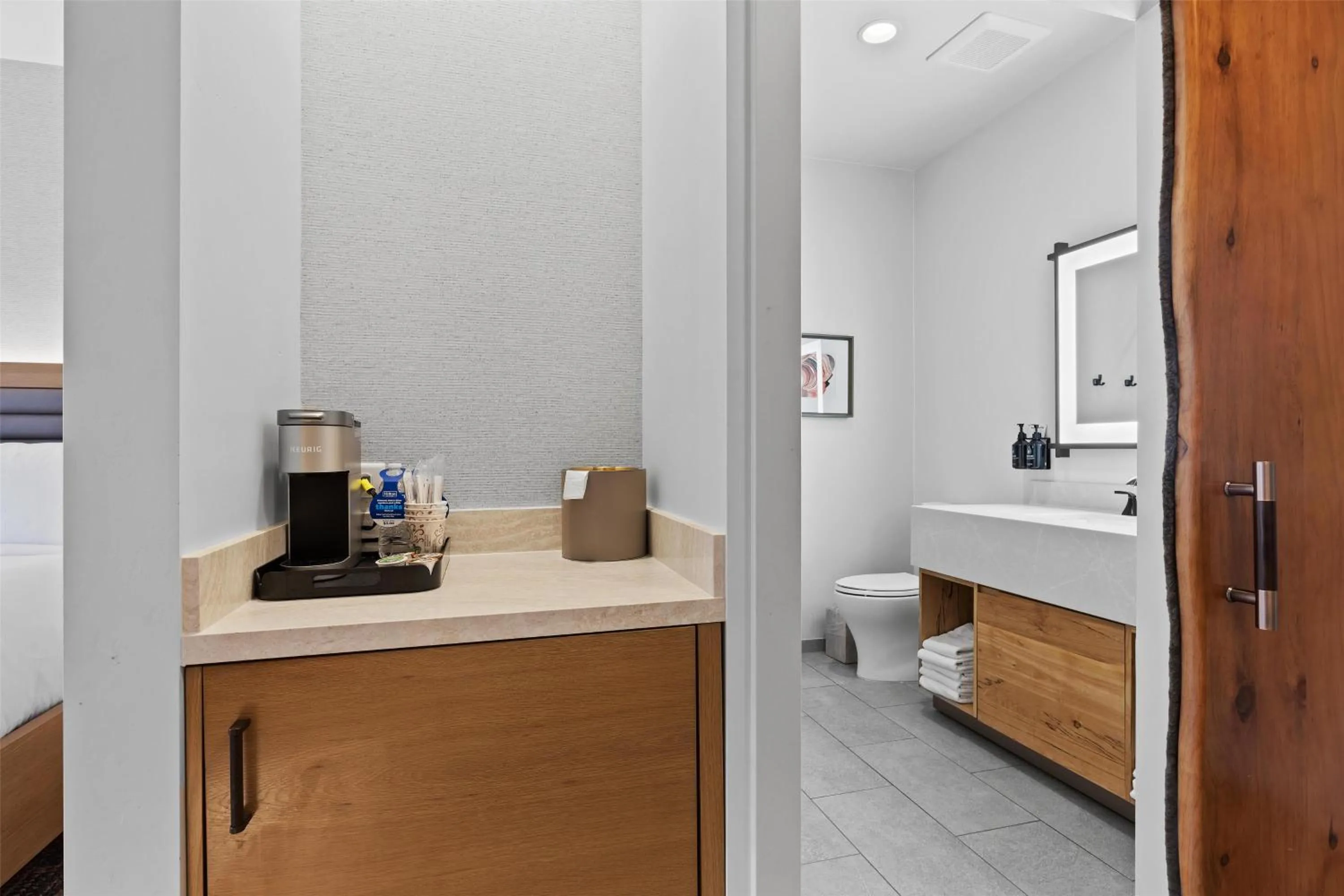 Bathroom in Hotel De Novo Springdale, Tapestry Collection by Hilton