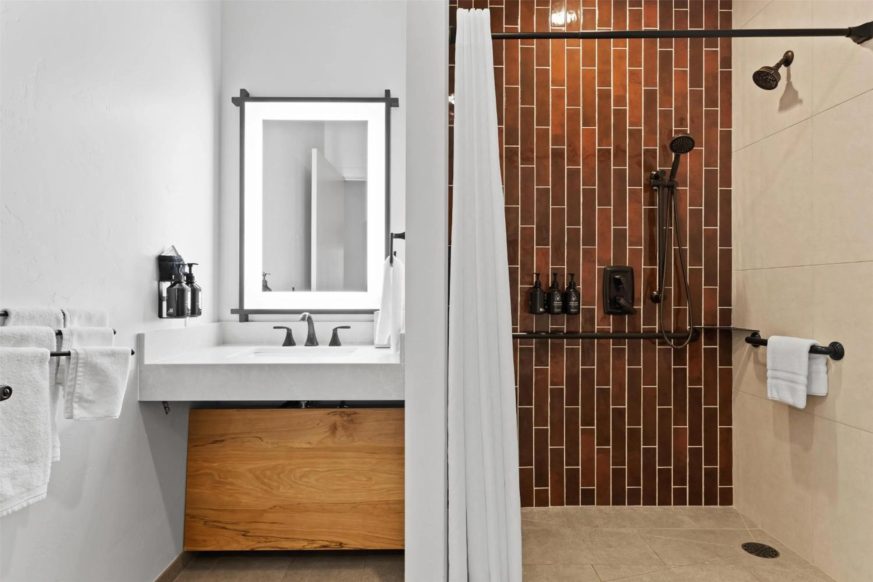 Bathroom in Hotel De Novo Springdale, Tapestry Collection by Hilton