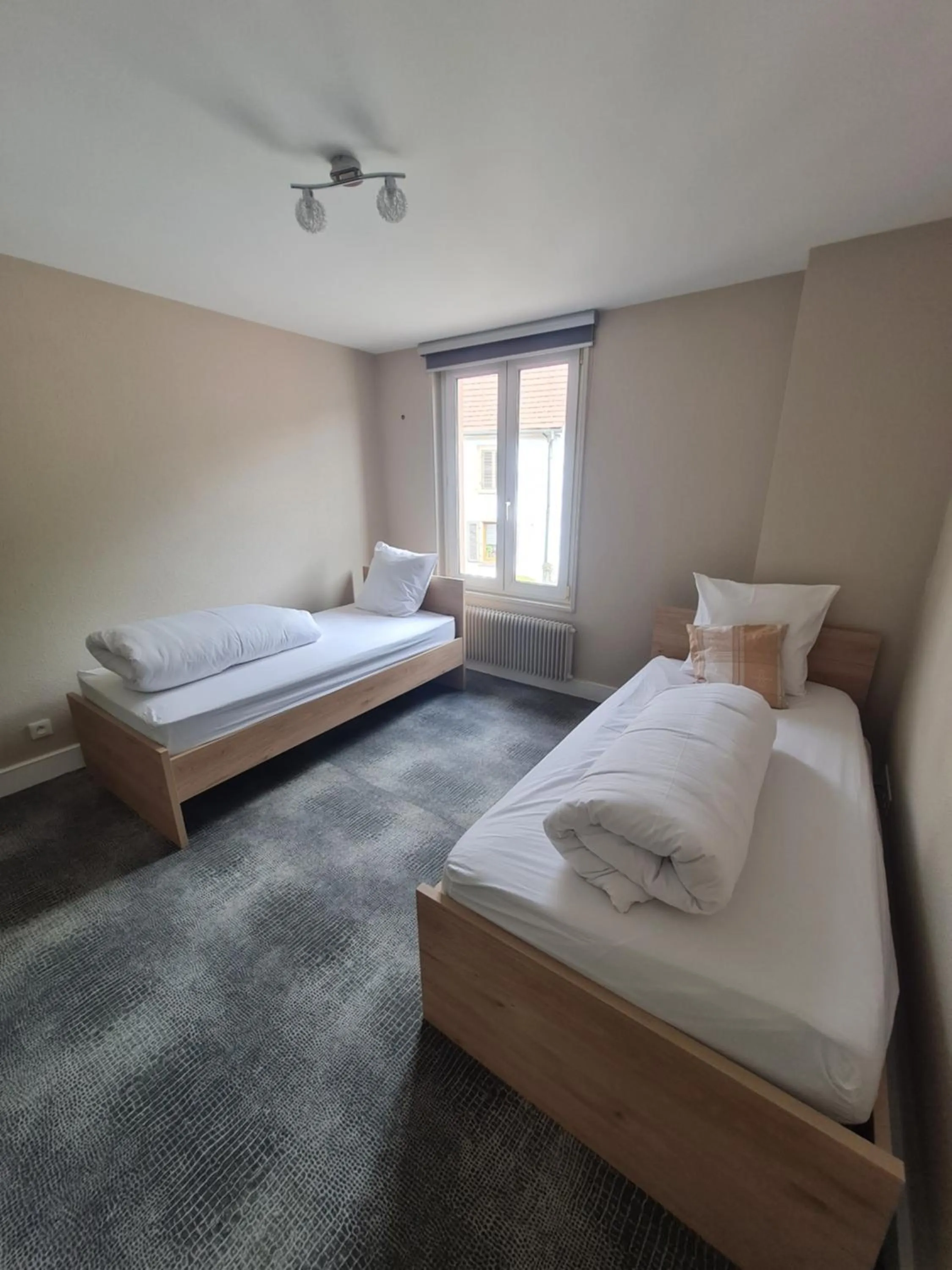 Bed in Hôtel Restaurant Valneige