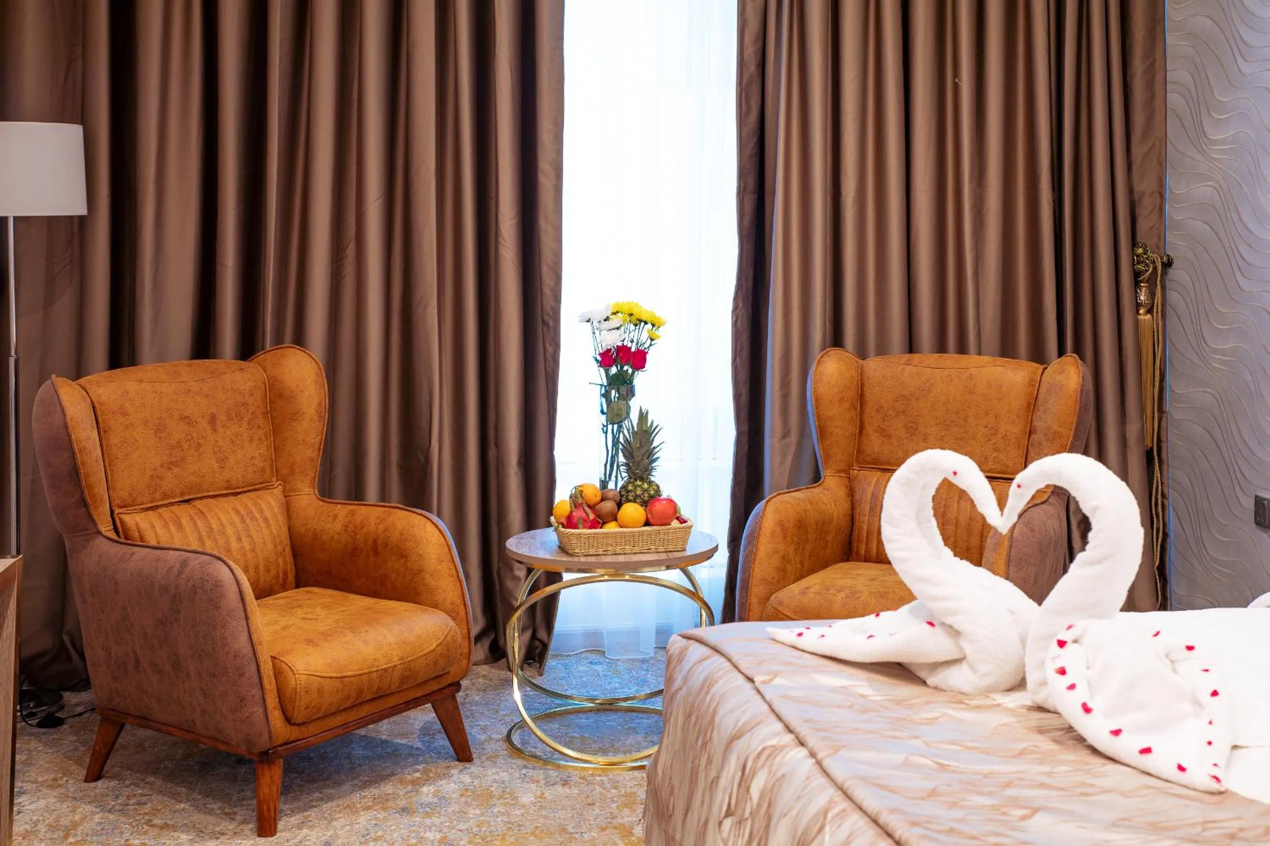 Living room, Bed in Al Mansour Plaza Hotel