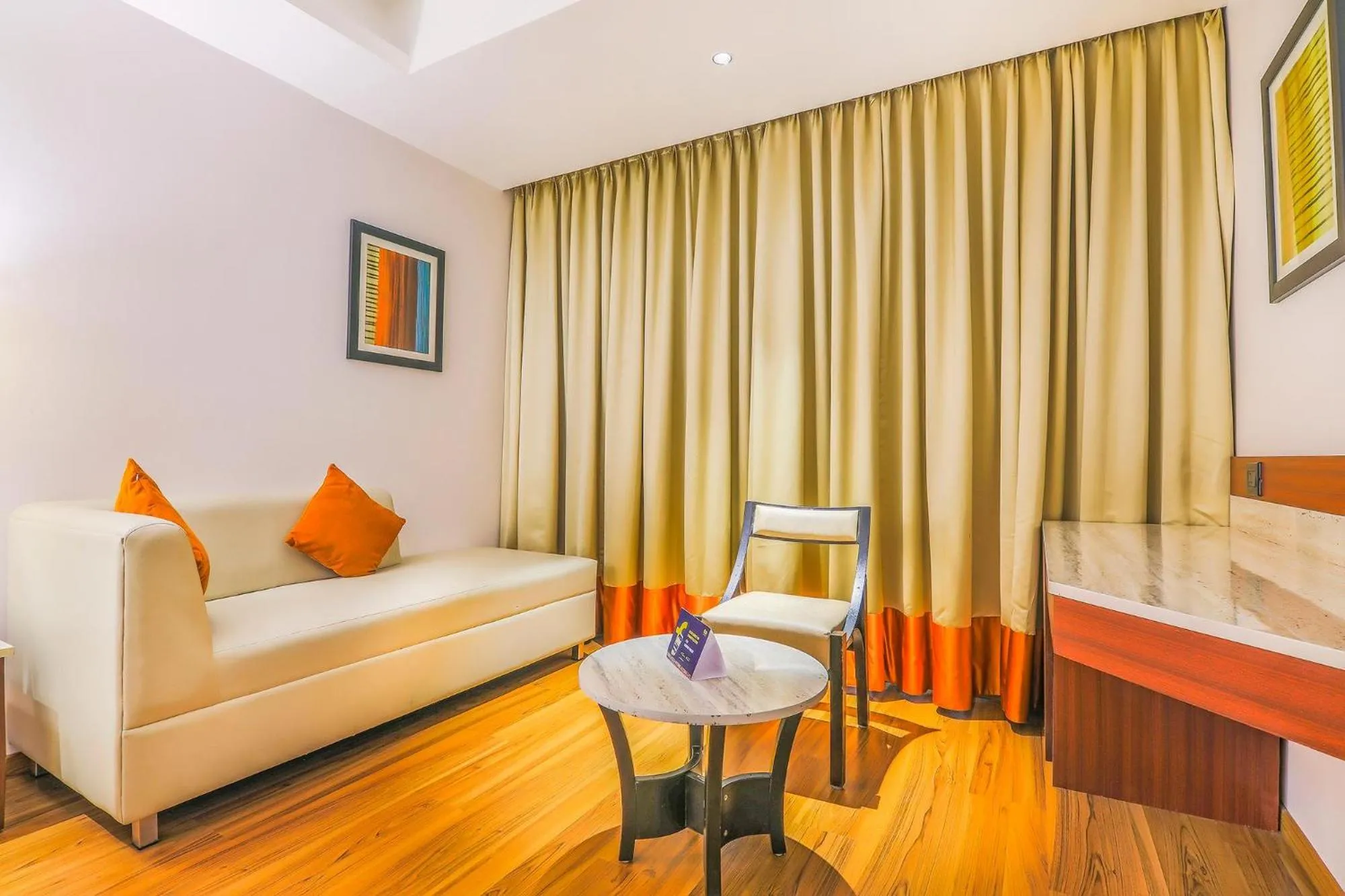 Seating area, Bed in FabHotel High Rise Suites - Nr Marathahalli Bridge