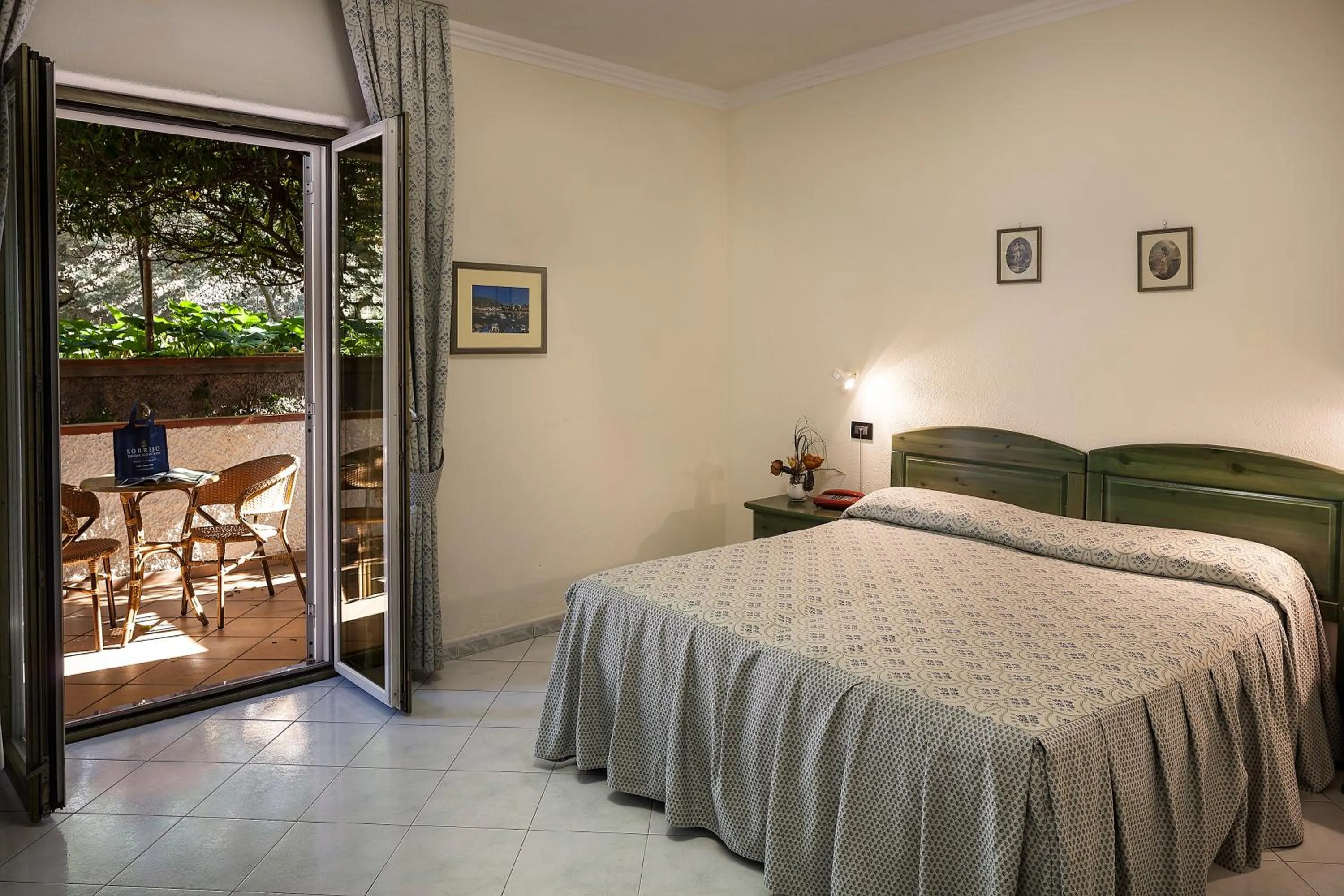 Bed in Sorriso Thermae Resort & Spa