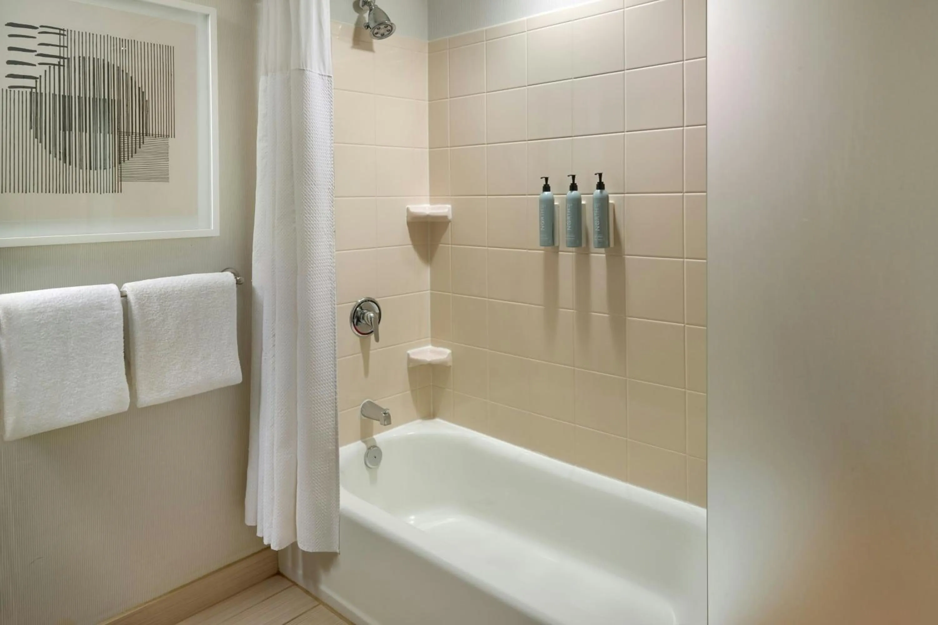 Bathroom in Courtyard by Marriott Birmingham Downtown at UAB